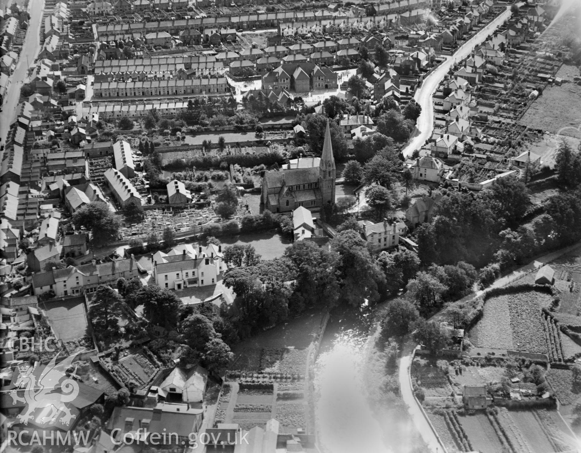 General view of Bridgend showing St Marys church, oblique aerial view. 5?x4? black and white glass plate negative.
