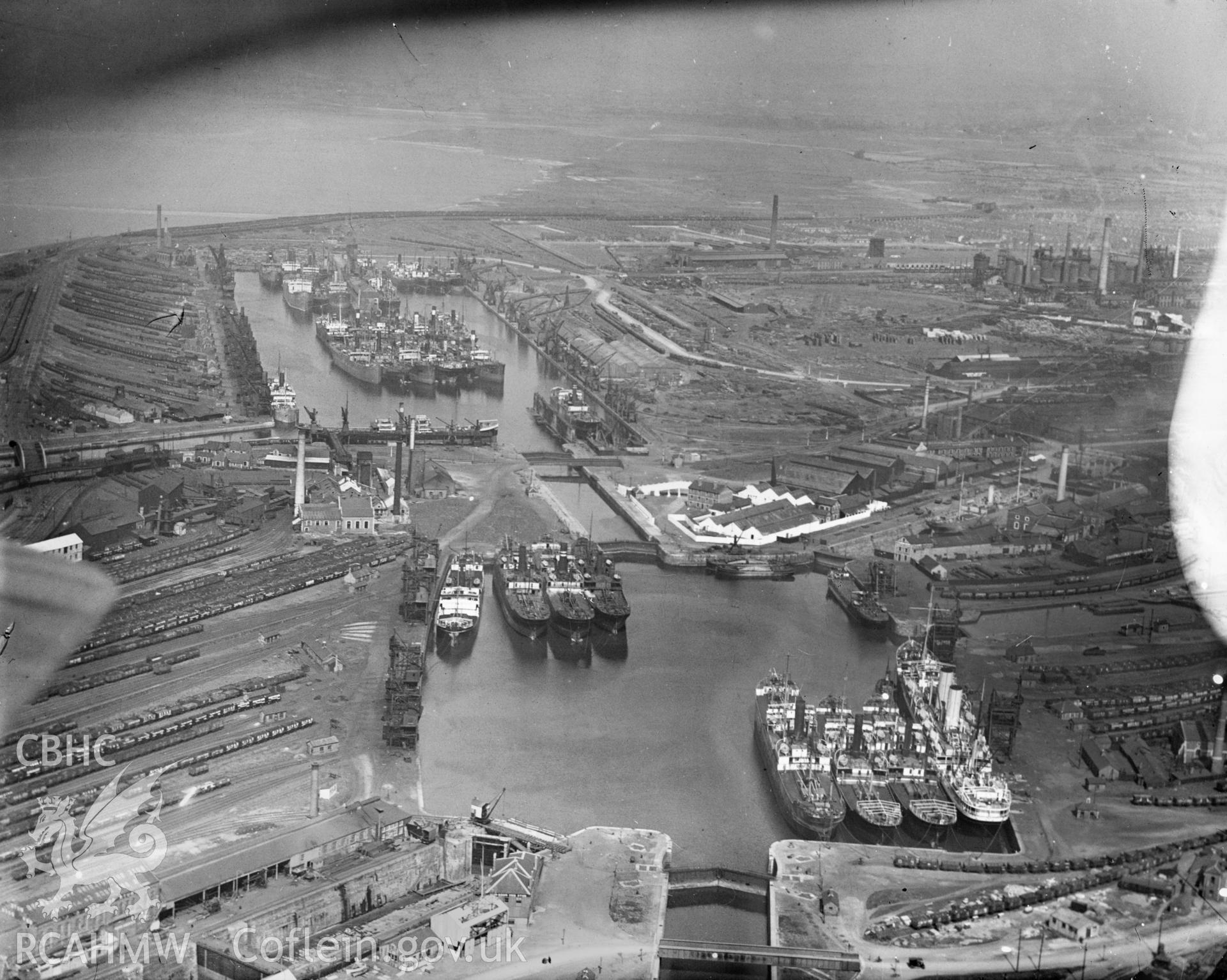 General view of Cardiff docks, oblique aerial view. 5?x4? black and white glass plate negative.