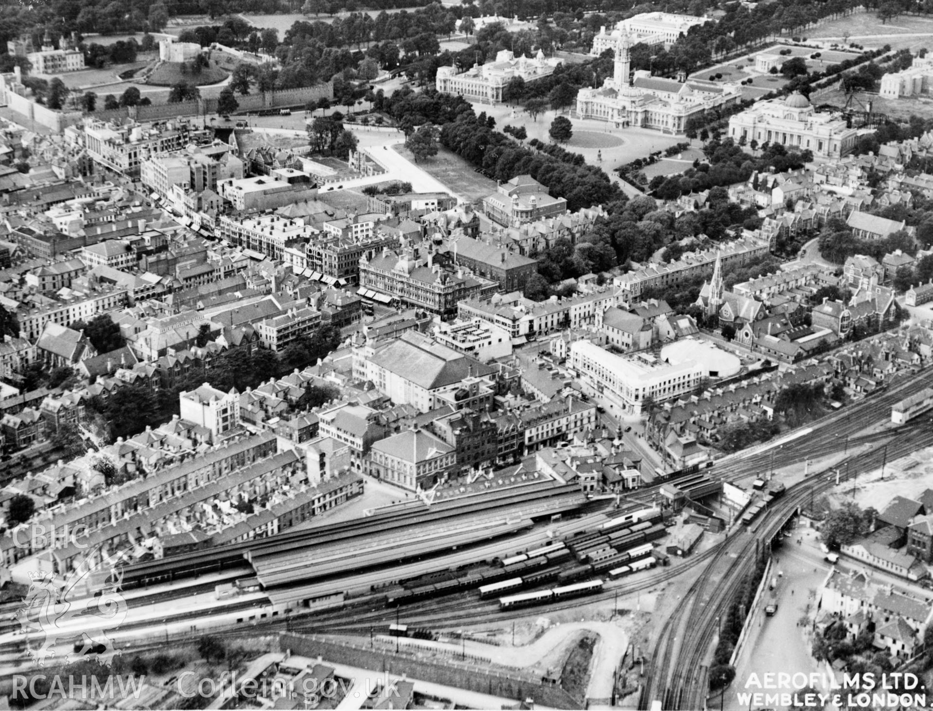 View of central Cardiff showing station, civic buildings and Queen Street. Oblique aerial photograph, 5?x4? BW glass plate.