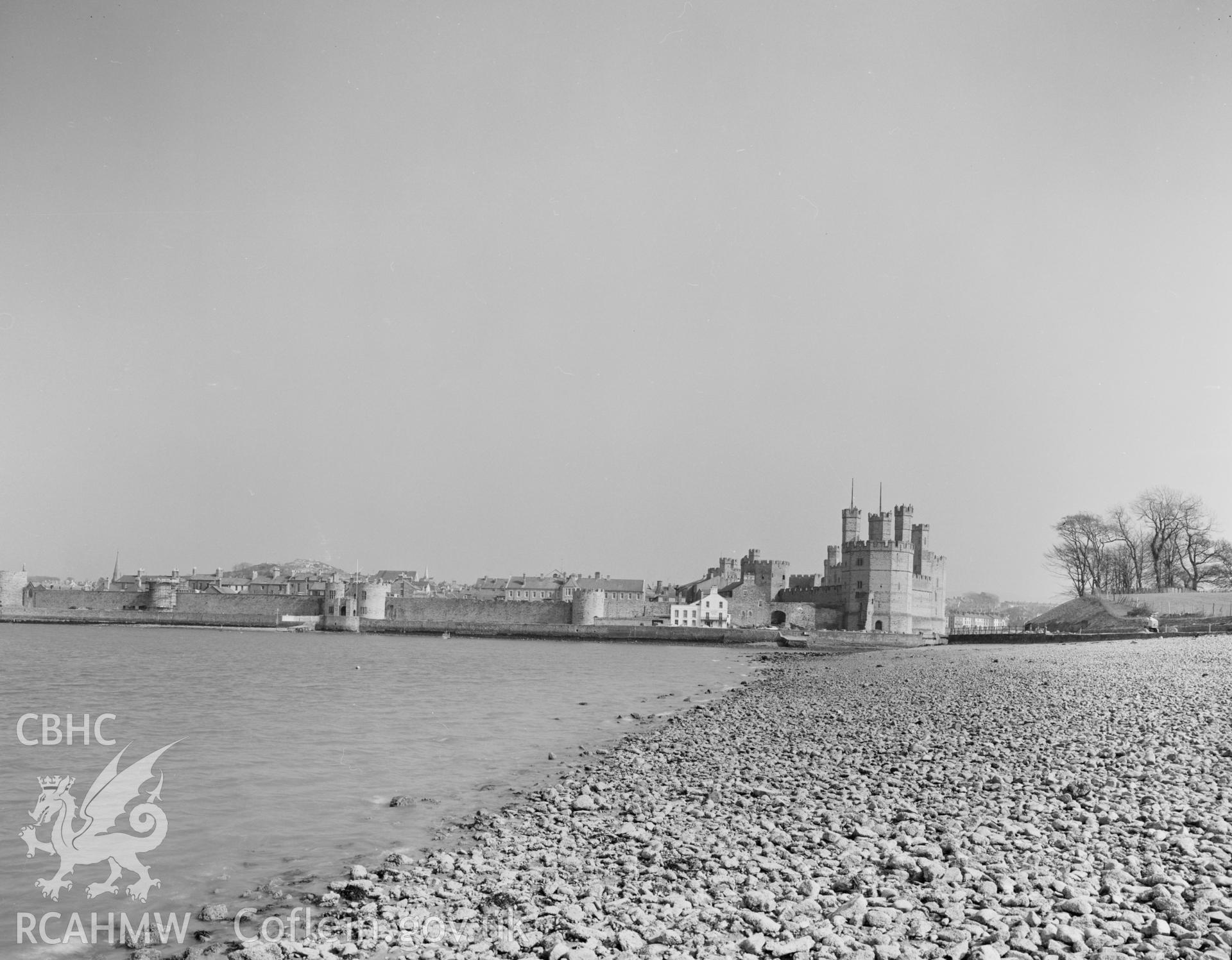 Digital copy of a black and white negative showing a view of Caernarfon Castle, from the Central Office of Information.