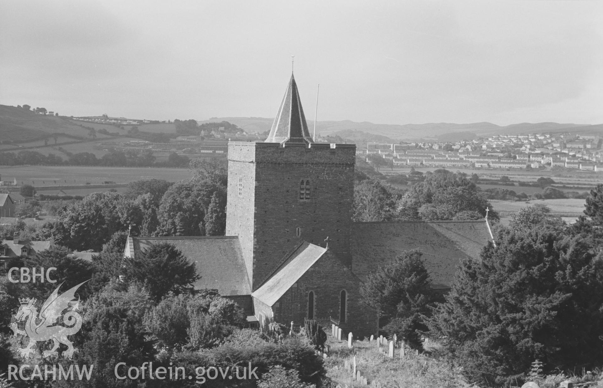 Digital copy of a black and white negative showing exterior view of St. Padarn's church, Llanbadarn, Aberystwyth, looking towards Penparcau. (View looking west from Grid Reference SN 599 811). Photographed by Arthur O. Chater in August 1967.