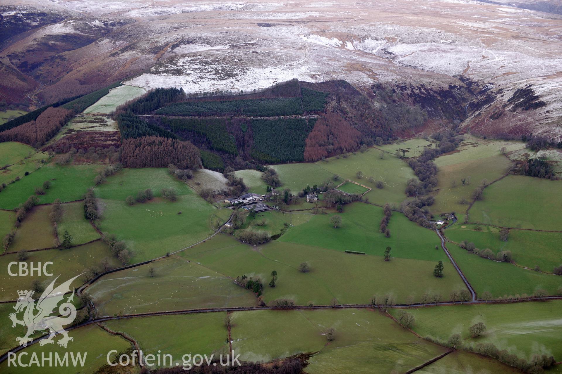Neuadd Fawr and its associated garden and home farm, Cilycwm, south west of Llanwrtyd Wells. Oblique aerial photograph taken during the Royal Commission?s programme of archaeological aerial reconnaissance by Toby Driver on 15th January 2013.