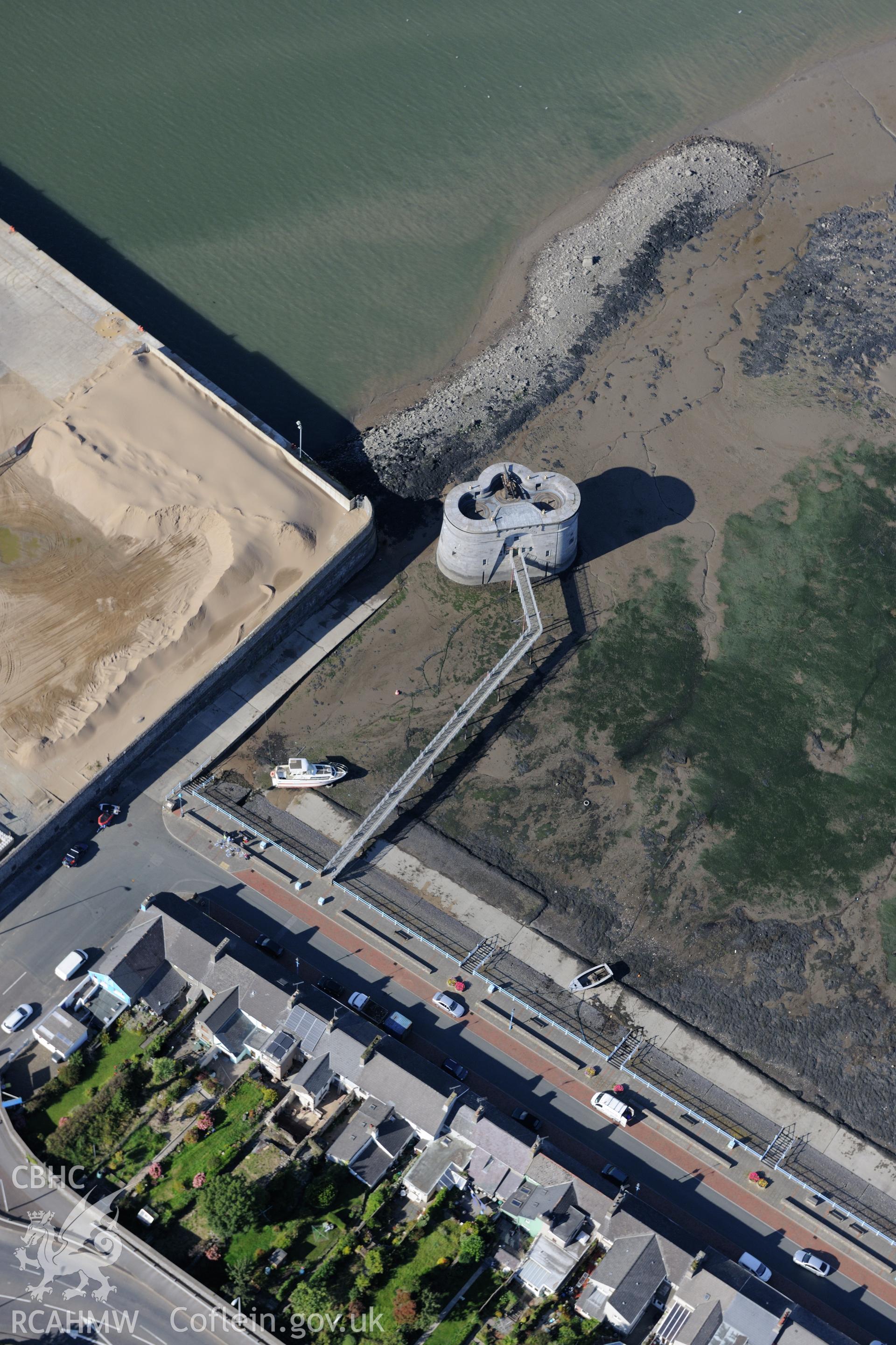 The west martello tower at Pembroke Dockyard. Oblique aerial photograph taken during the Royal Commission's programme of archaeological aerial reconnaissance by Toby Driver on 30th September 2015.