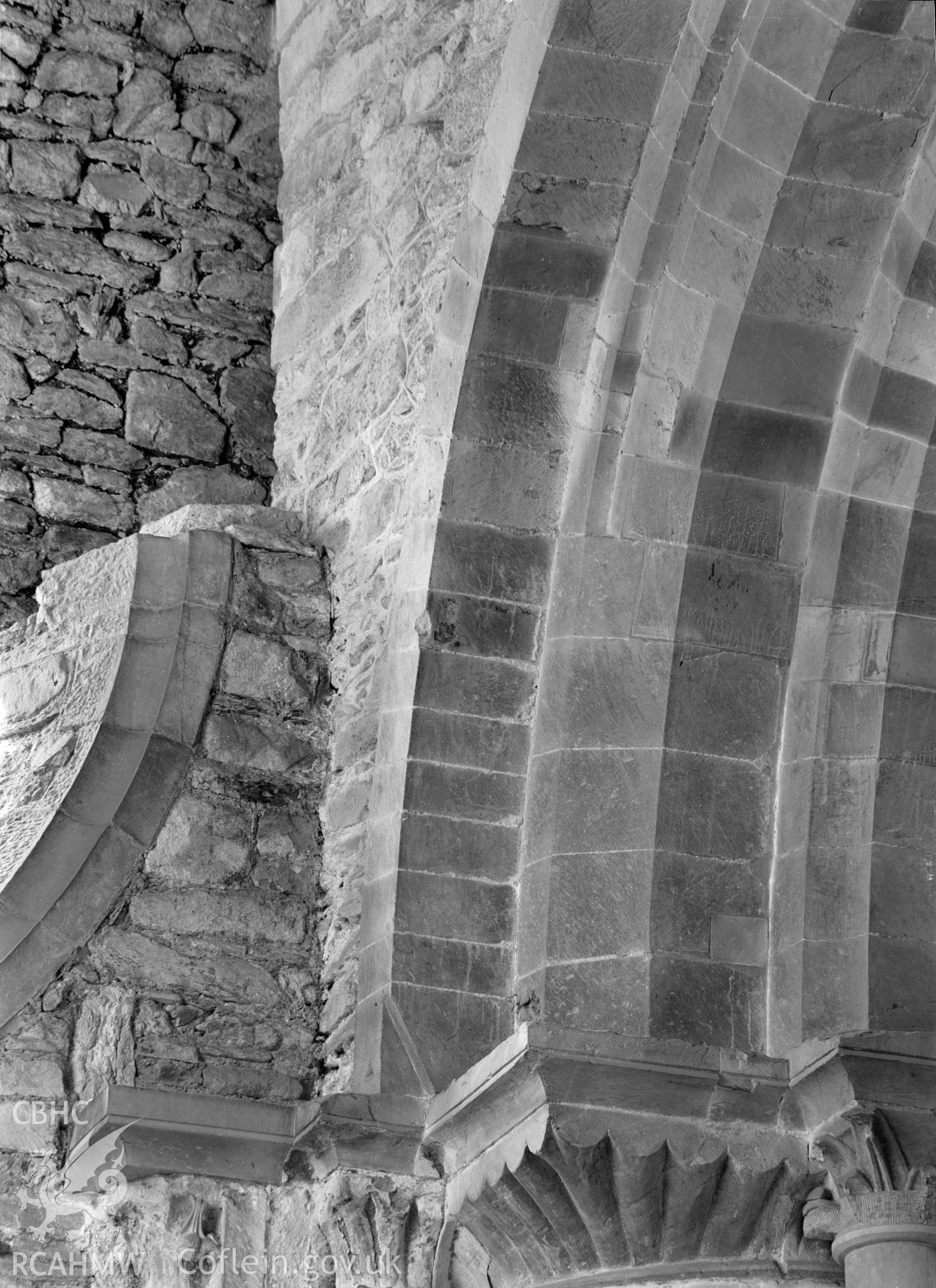 Digital copy of a black and white nitrate negative showing detail view of archway at St. David's Cathedral, taken by E.W. Lovegrove, July 1936