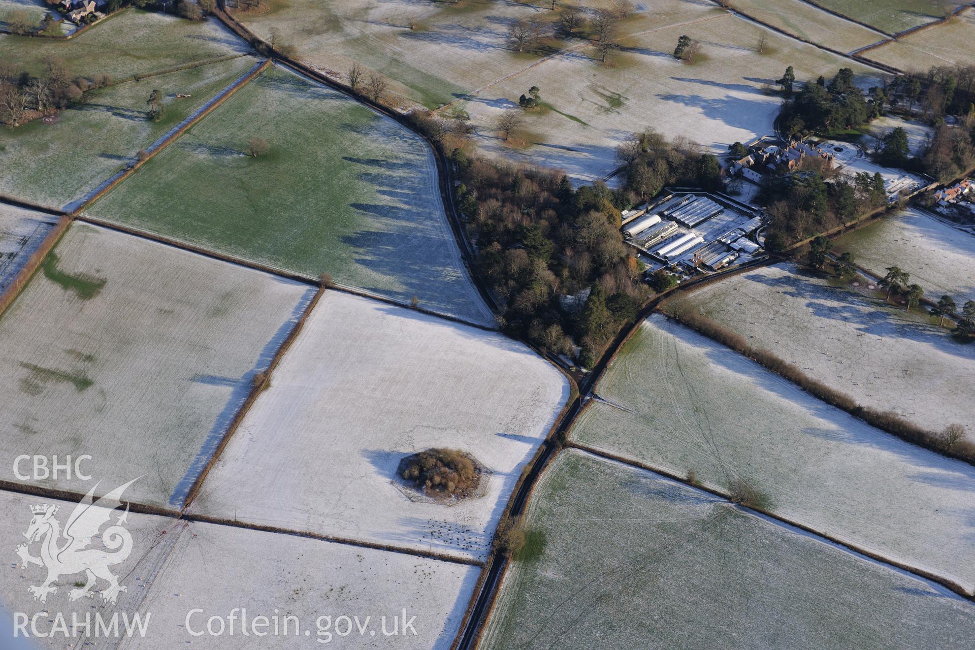 Treberfydd mansion and garden, and Twmpan Motte, Llangors, south east of Brecon. Oblique aerial photograph taken during the Royal Commission?s programme of archaeological aerial reconnaissance by Toby Driver on 15th January 2013.