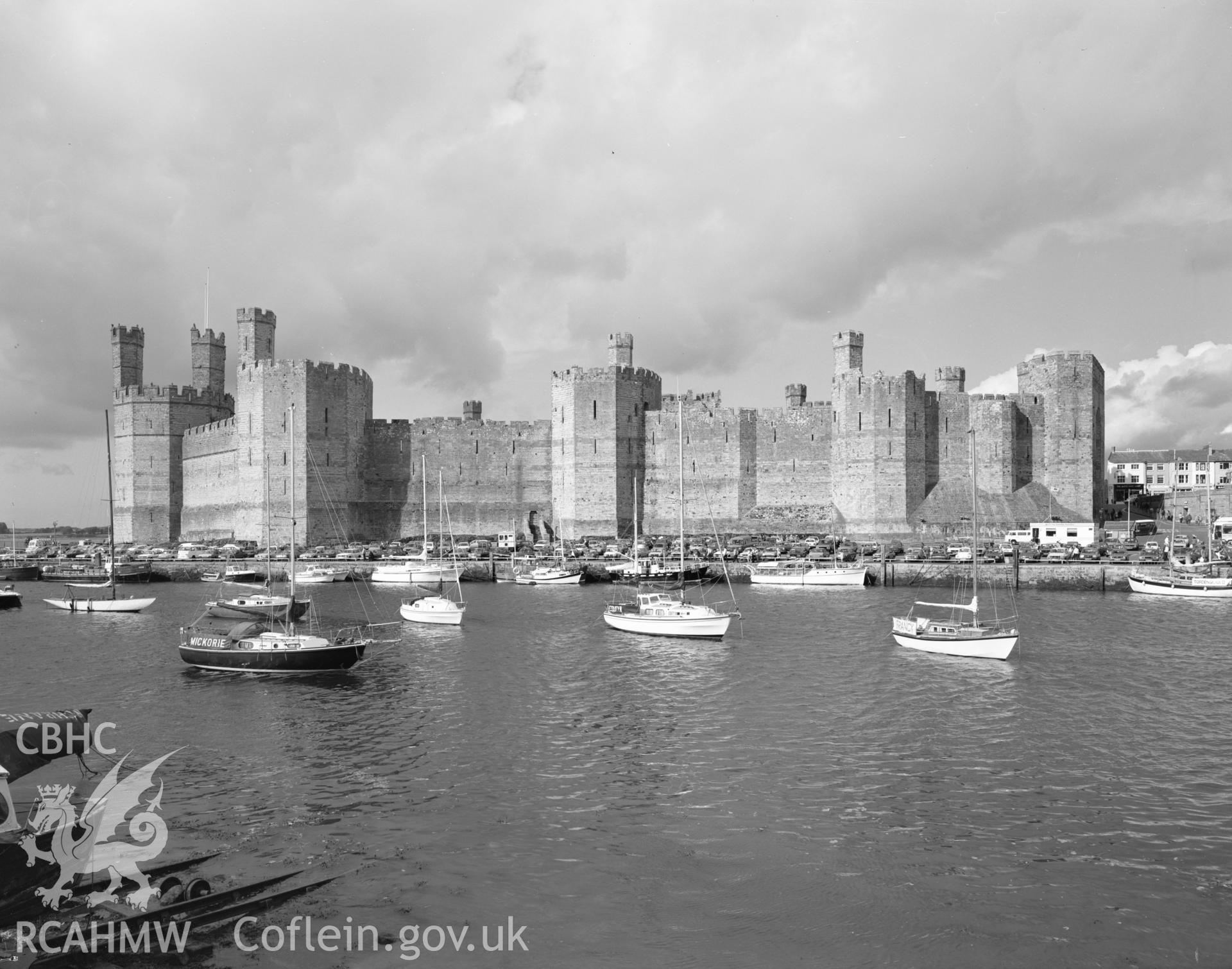 Digital copy of a black and white negative showing Caernarfon Castle, collated by the former Central Office of Information.
