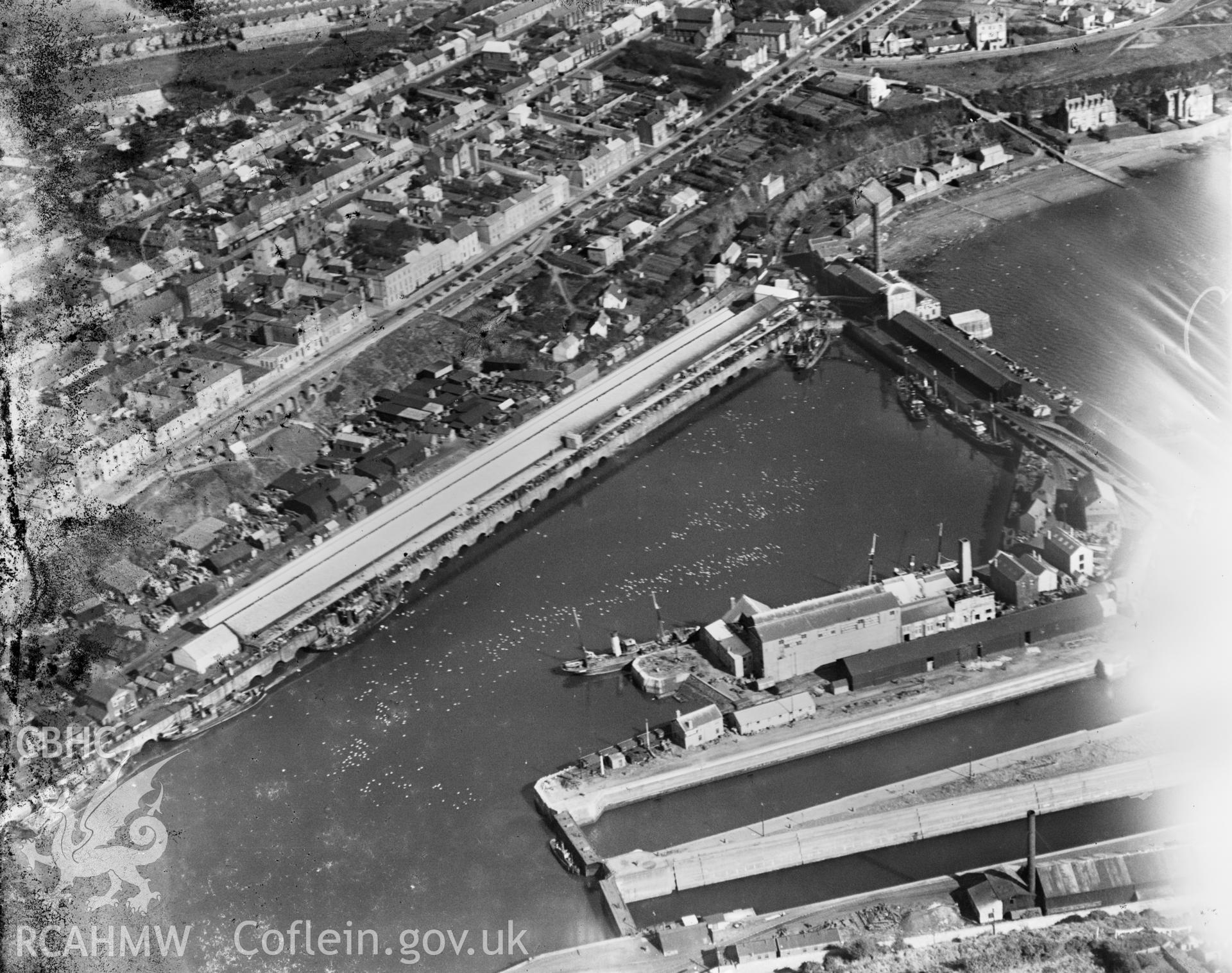 View of Milford Haven and docks, oblique aerial view. 5?x4? black and white glass plate negative.