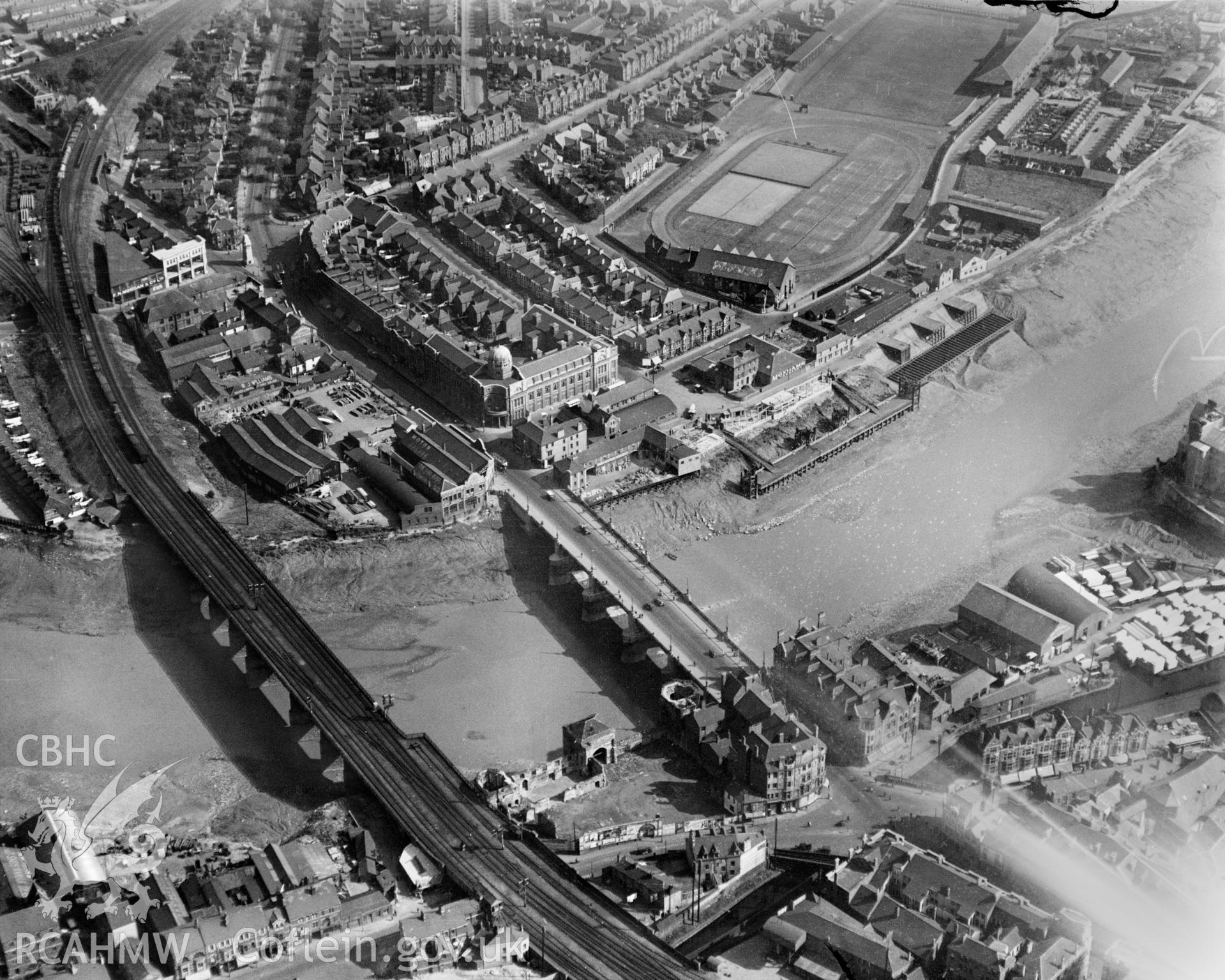Newport, showing Rodney Parade and bridges, oblique aerial view. 5?x4? black and white glass plate negative.