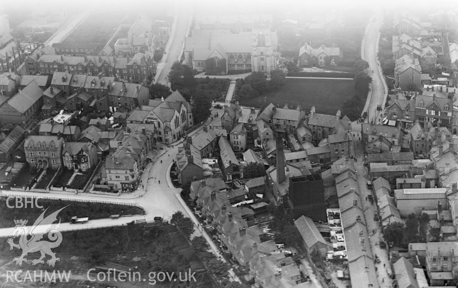 View of Colwyn Bay showing part of town including St Paul's church, oblique aerial view. 5?x4? black and white glass plate negative.