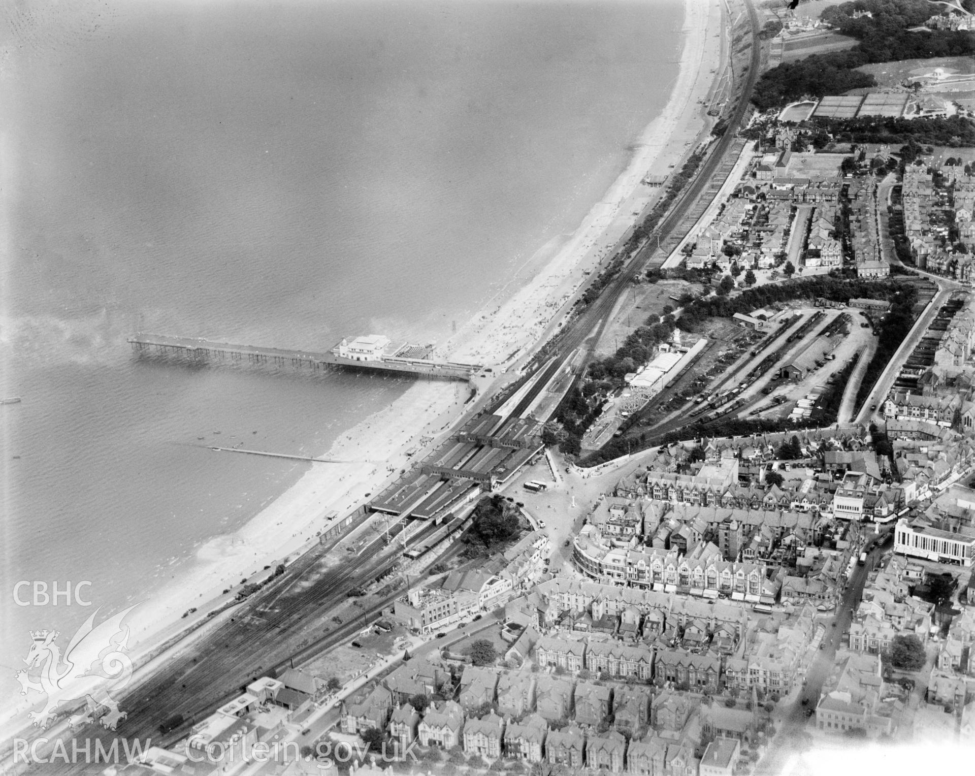 View of Colwyn Bay showing pier and railway station, oblique aerial view. 5?x4? black and white glass plate negative.