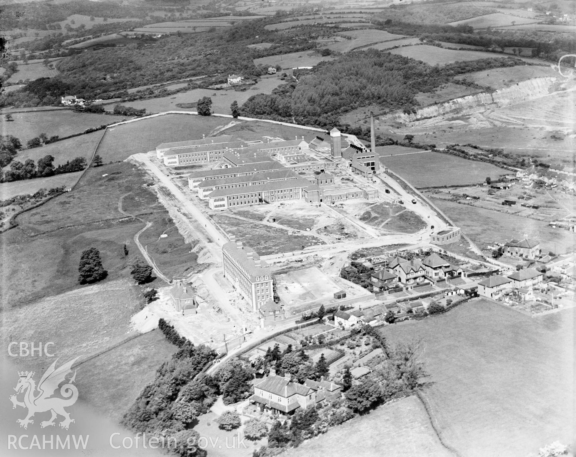 View of construction of Llandough Hospital, Penarth, oblique aerial view. 5?x4? black and white glass plate negative.