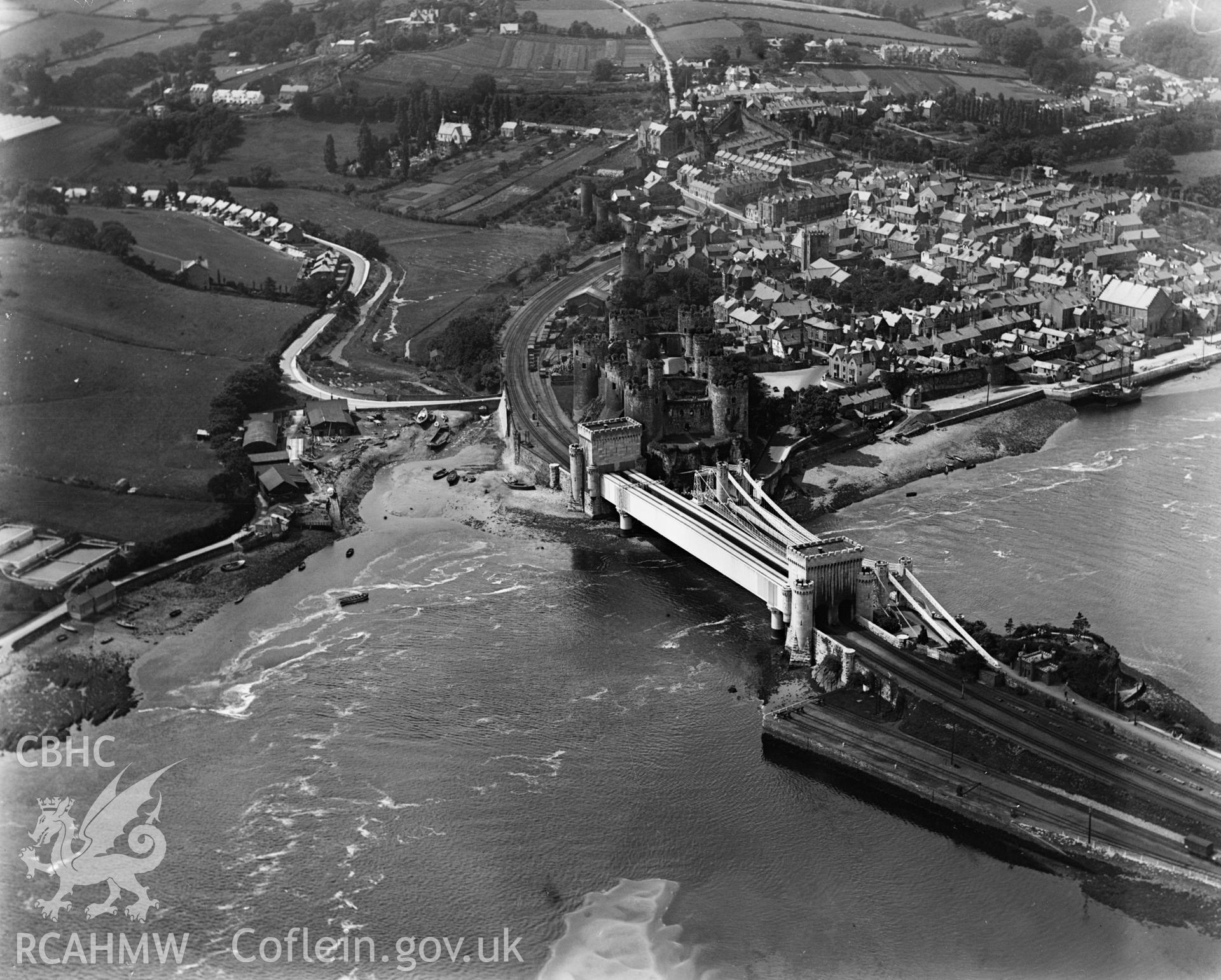 View of Conwy showing bridges, oblique aerial view. 5?x4? black and white glass plate negative.