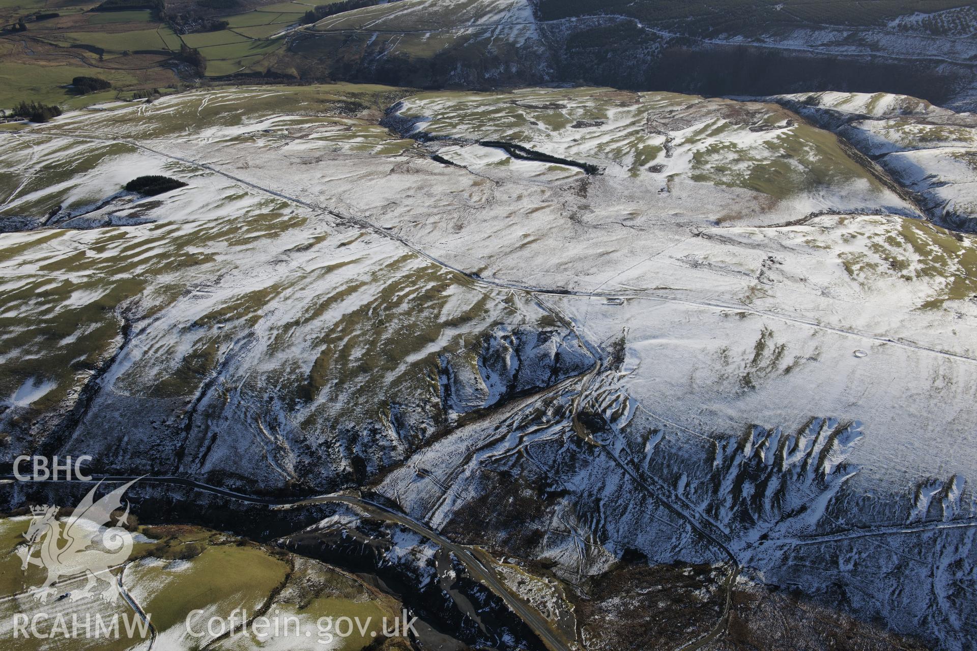 Area of apparent hushing features north east of Penycrocbren, south of Dylife, near Machynlleth. Oblique aerial photograph taken during the Royal Commission's programme of archaeological aerial reconnaissance by Toby Driver on 4th February 2015.