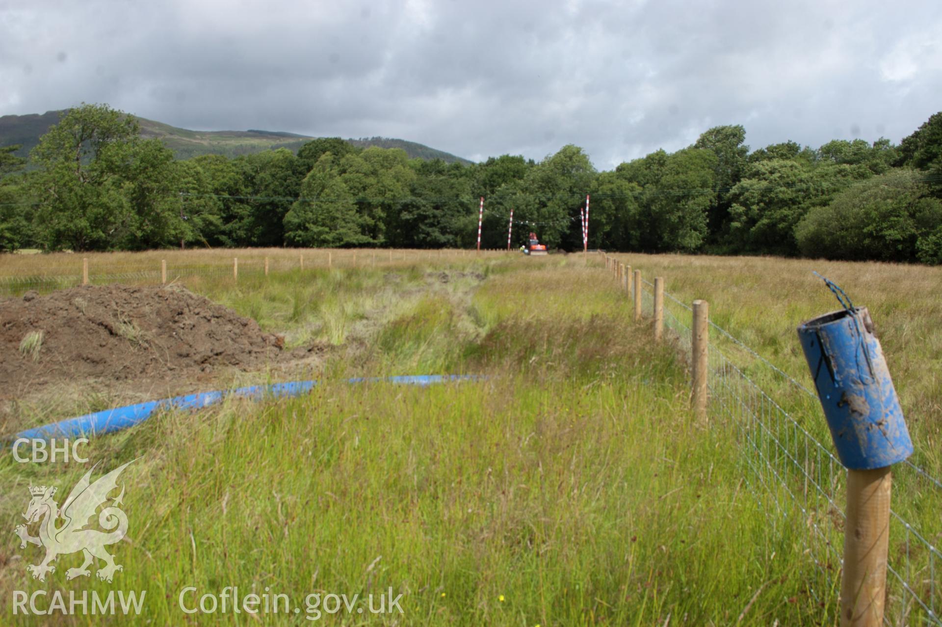 Digital photograph showing general view looking north along the pipeline route. Photographed during Gwynedd Archaeological Trust's archaeological watching brief of water main renewal in Dolgellau on 28th July 2017. Project no. G2528.
