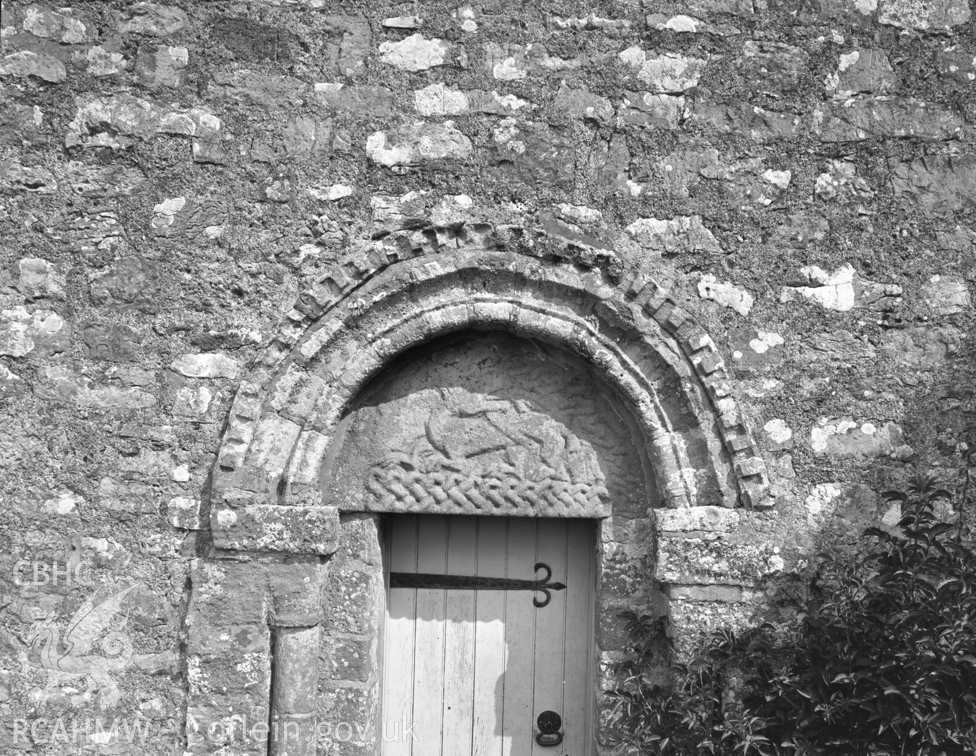 Digital copy of a view of the doorway to Penmon Priory taken by Department of Environment 1976.