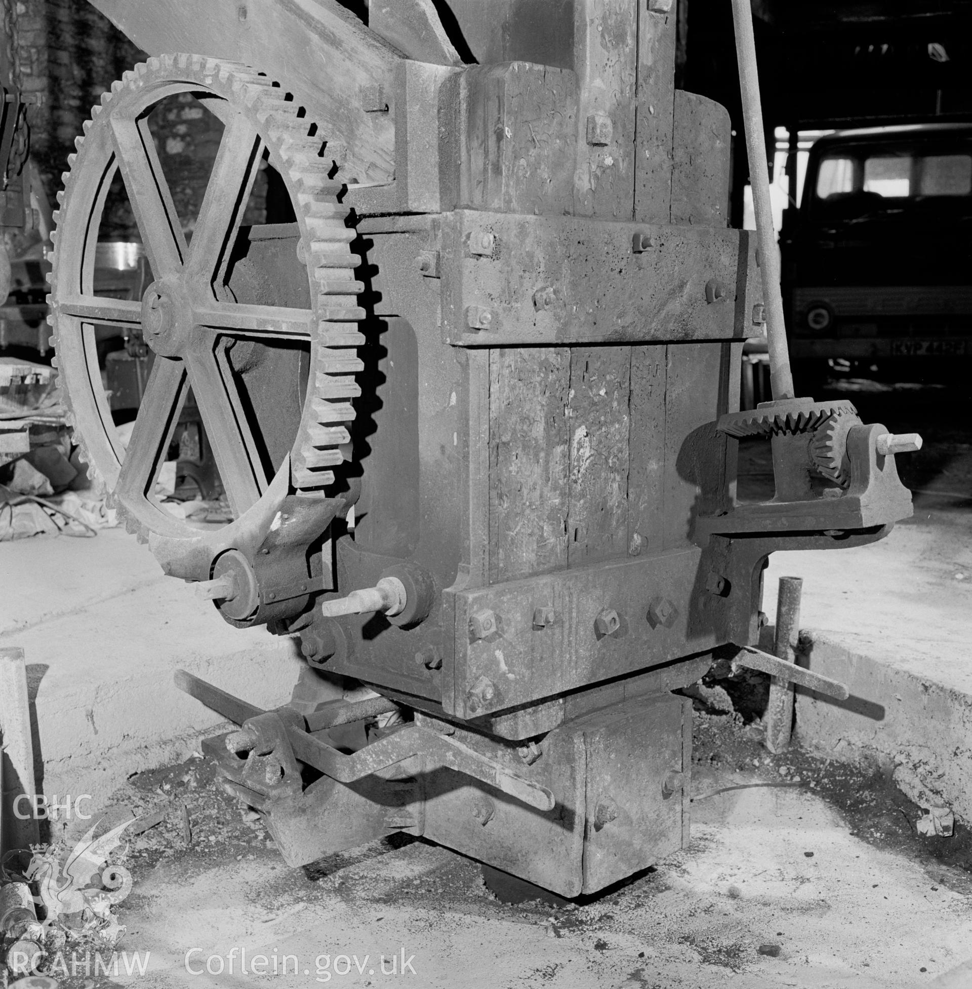 Digital copy of a black and white negative showing detail of the crane at Player's Works Foundry, Clydach, taken by RCAHMW, undated.