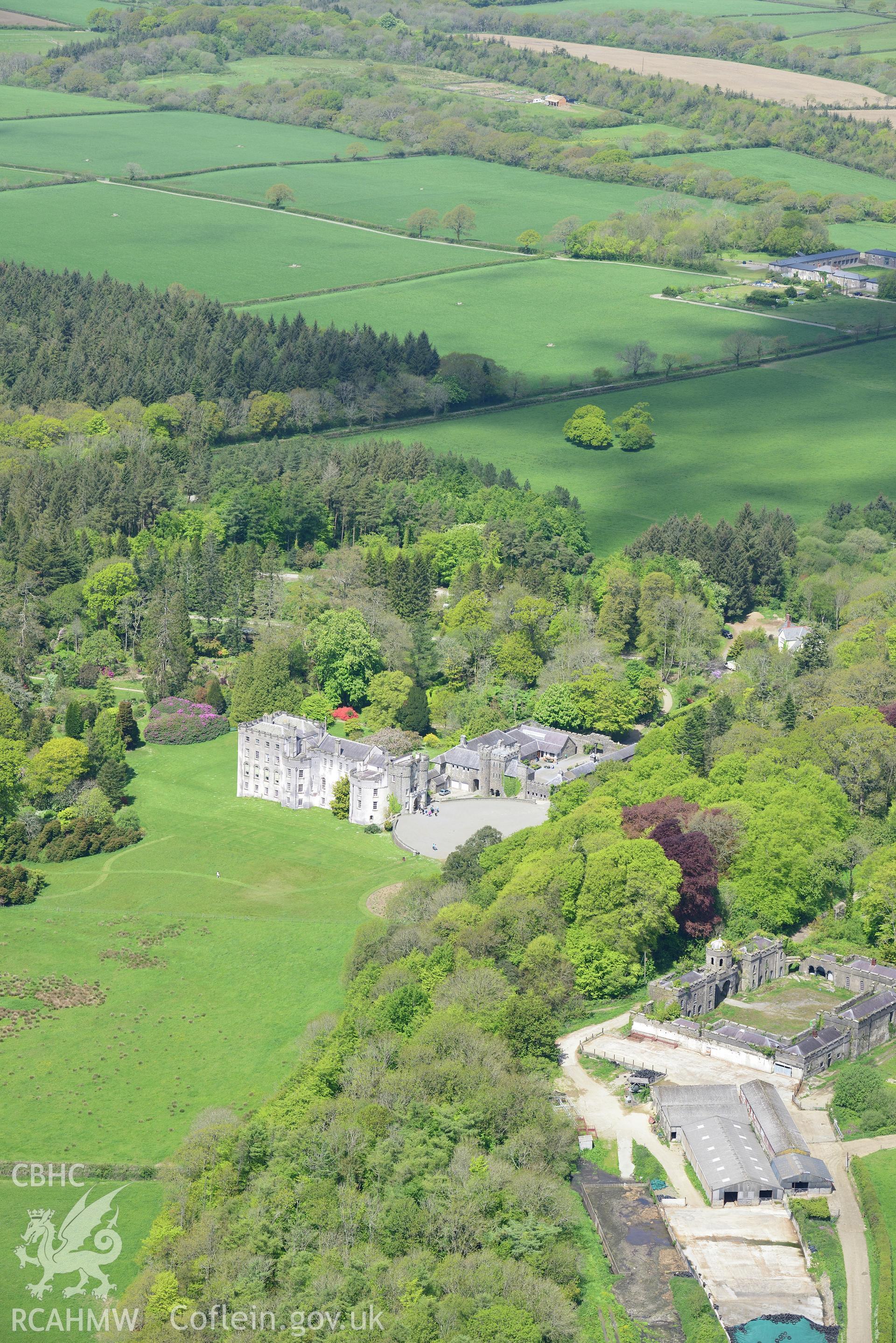 Picton Castle, its gardens and its stables, Slebech. Oblique aerial photograph taken during the Royal Commission's programme of archaeological aerial reconnaissance by Toby Driver on 13th May 2015.