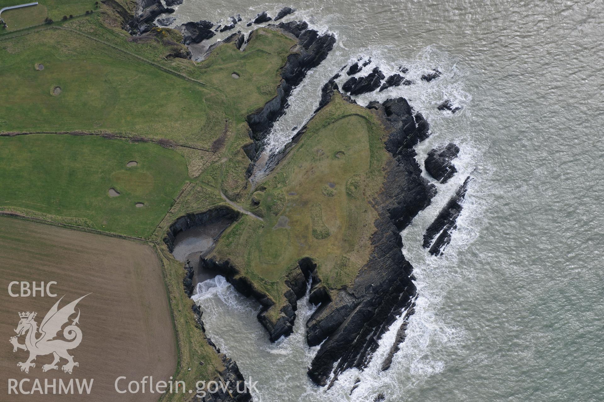 Craig-y-Gwbert and the site of former Craig-y-Gwbert lime kiln, Gwbert, near Cardigan. Oblique aerial photograph taken during the Royal Commission's programme of archaeological aerial reconnaissance by Toby Driver on 13th March 2015.
