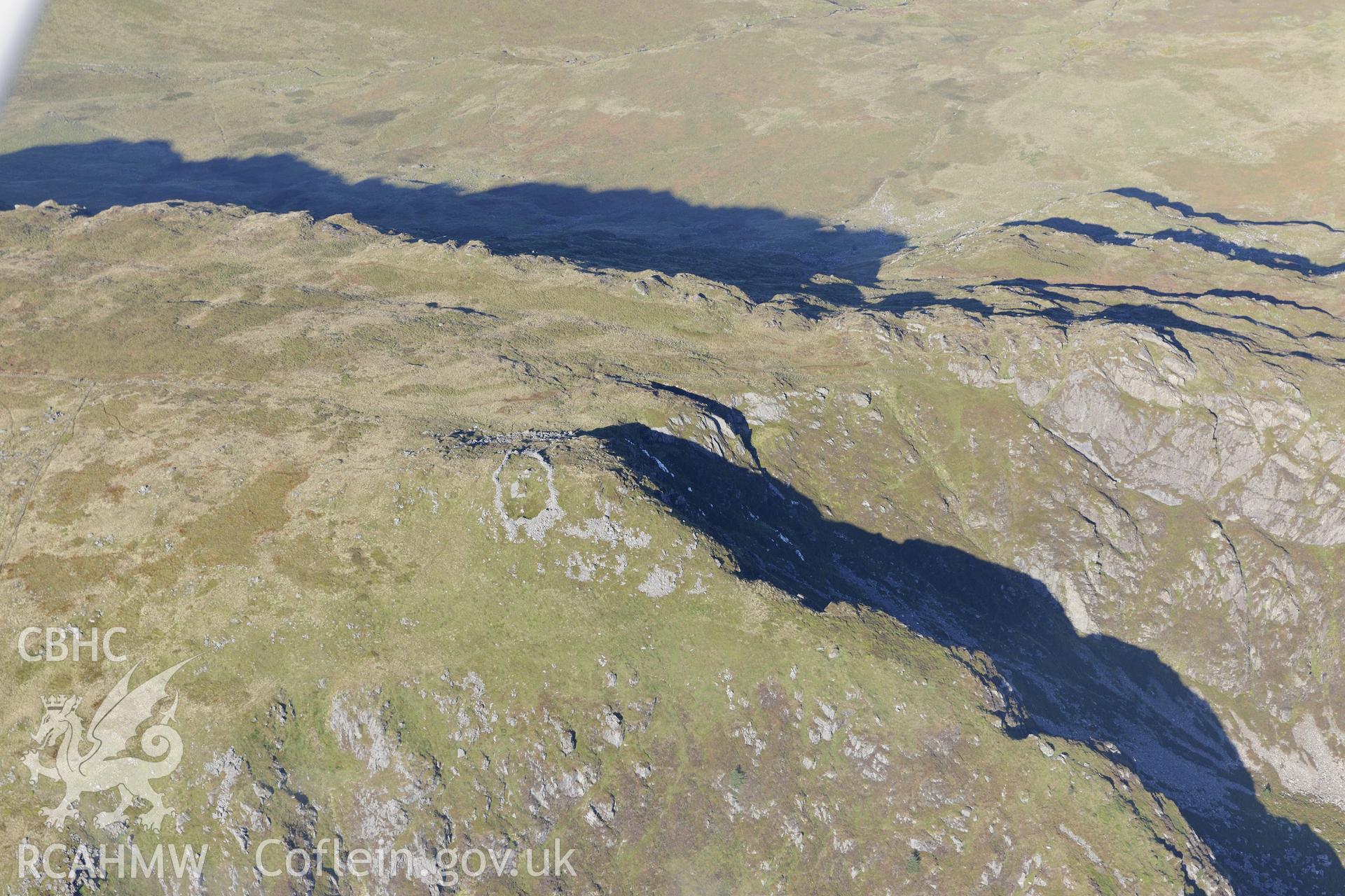 Cau Graig enclosure, on the north-east summit of Cader Idris. Oblique aerial photograph taken during the Royal Commission's programme of archaeological aerial reconnaissance by Toby Driver on 2nd October 2015.
