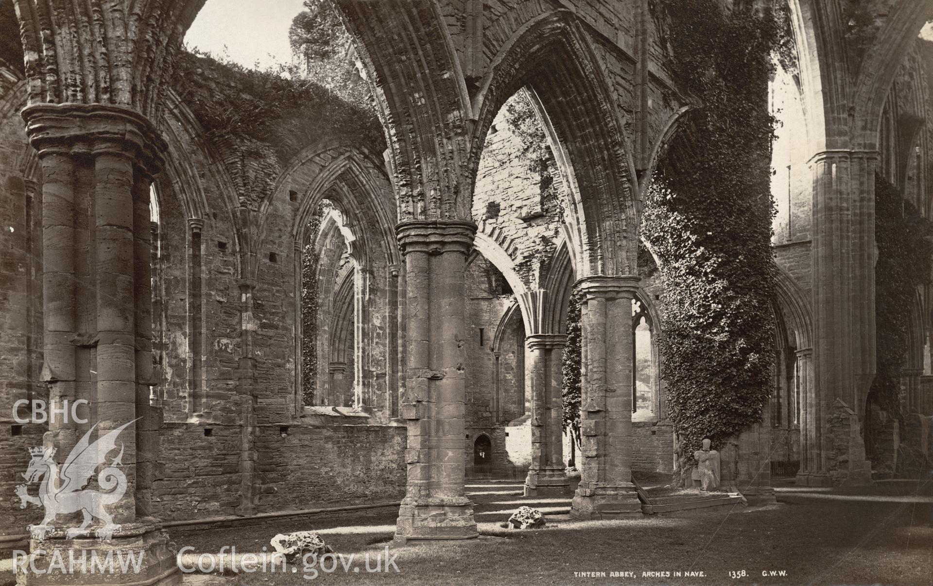 Digital copy of a circa 1870 albumen print of an interior view of Tintern Abbey showing arches in the nave.