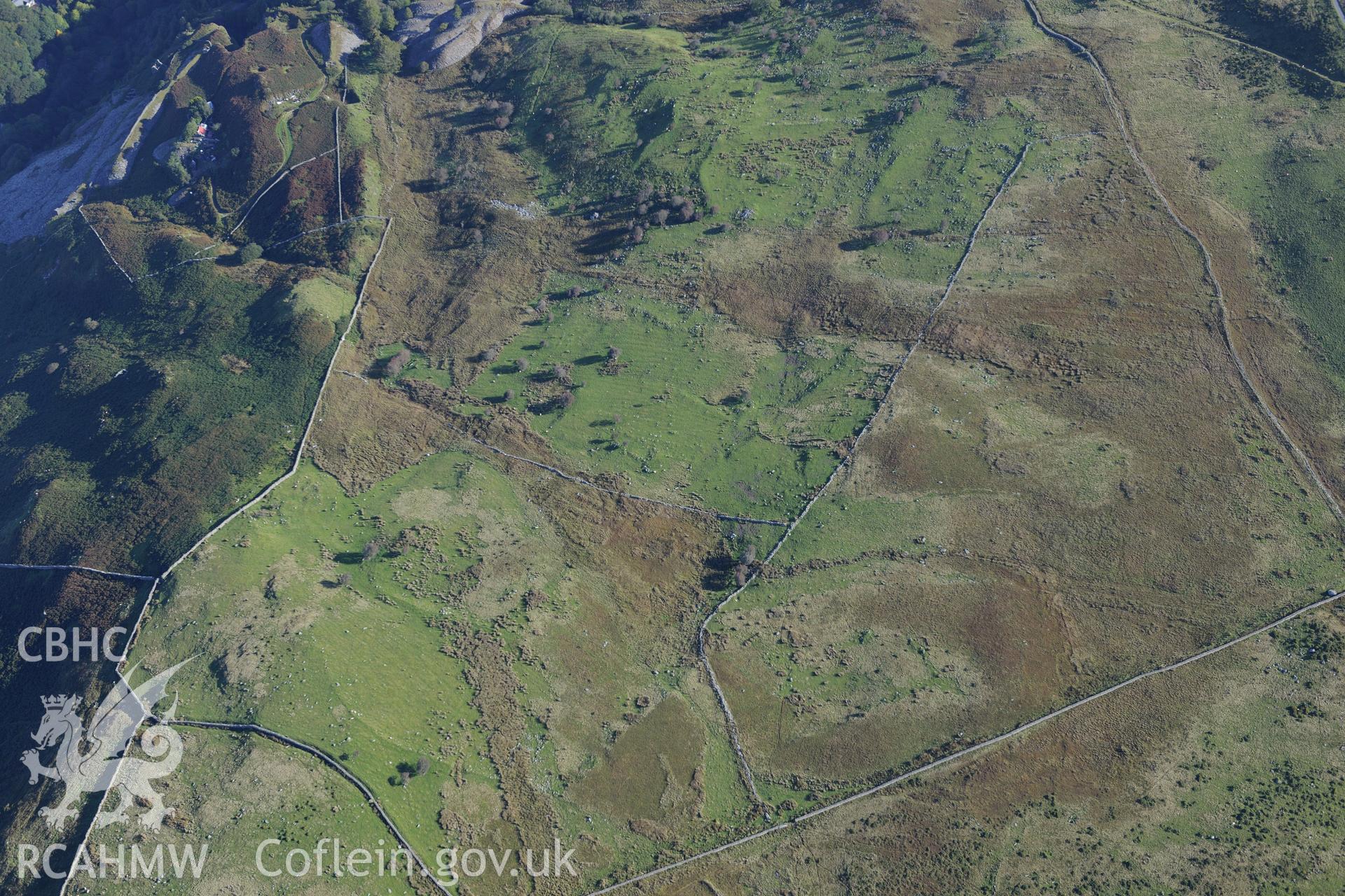Field system north west of Bryn Seward, cultivation features north of Morfa, and Goleuwern and Hen-Ddol quarries above, at Friog, near Fairbourne. Oblique aerial photograph taken during the Royal Commission's programme of archaeological aerial reconnaissance by Toby Driver on 2nd October 2015.