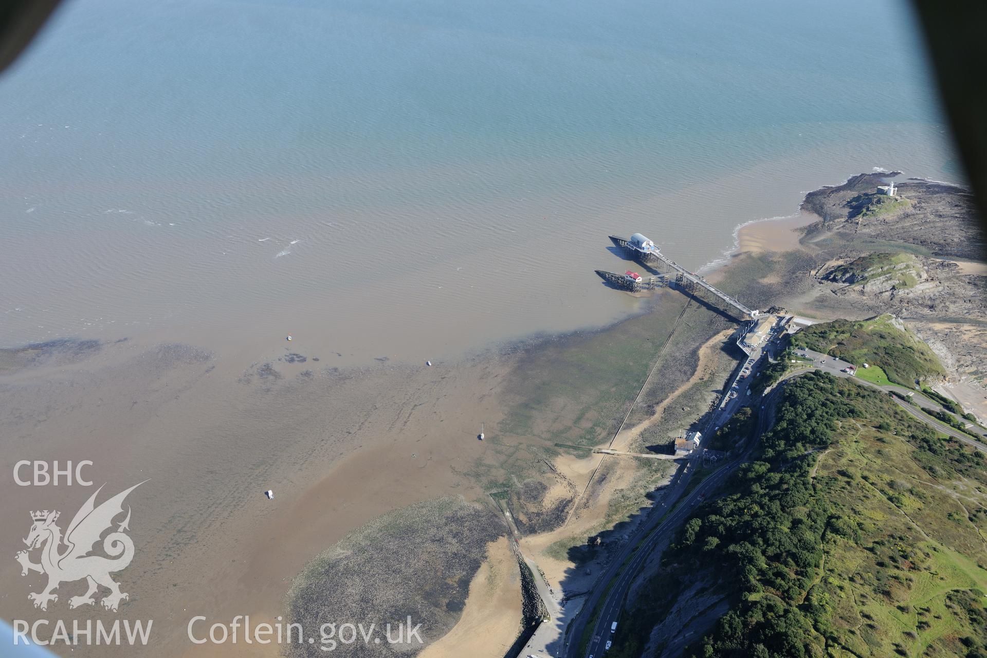 Mumbles fort, Mumbles pier and Mumbles lighthouse at the south western edge of Swansea Bay. Oblique aerial photograph taken during the Royal Commission's programme of archaeological aerial reconnaissance by Toby Driver on 30th September 2015.