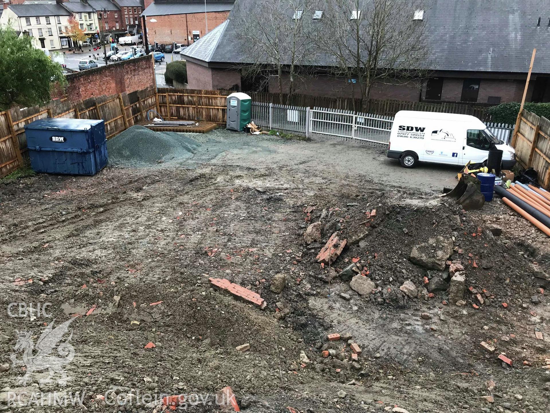 Digital colour photograph showing 'Area C after excavation, looking south.' Photographed during Archaeological Watching Brief conducted at Welshpool Social Club, Bronybuckley, Welshpool, Powys. Prepared by Archaeology Wales, November 2018. Report no. 1723.