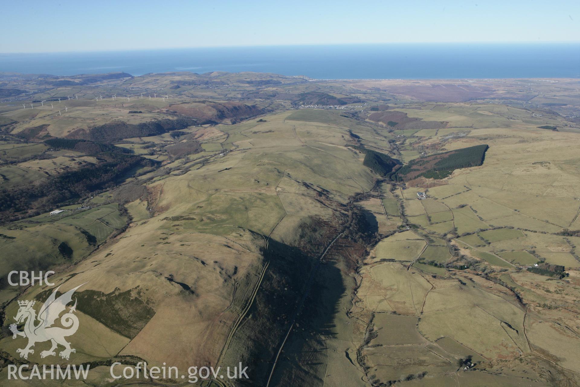 RCAHMW colour oblique photograph of Talybont, looking east from Cwm Ceulan. Taken by Toby Driver on 08/03/2010.