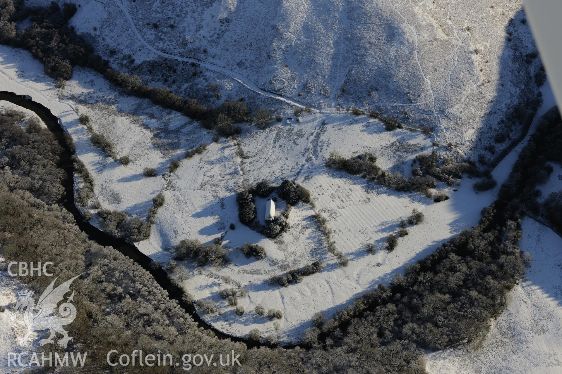 The medieval settlement of Cefnllys, Cefnllys field system and St. Michael's church, on the banks of the river Ithon, east of Llandrindod Wells. Oblique aerial photograph taken during the Royal Commission?s programme of archaeological aerial reconnaissance by Toby Driver on 15th January 2013.
