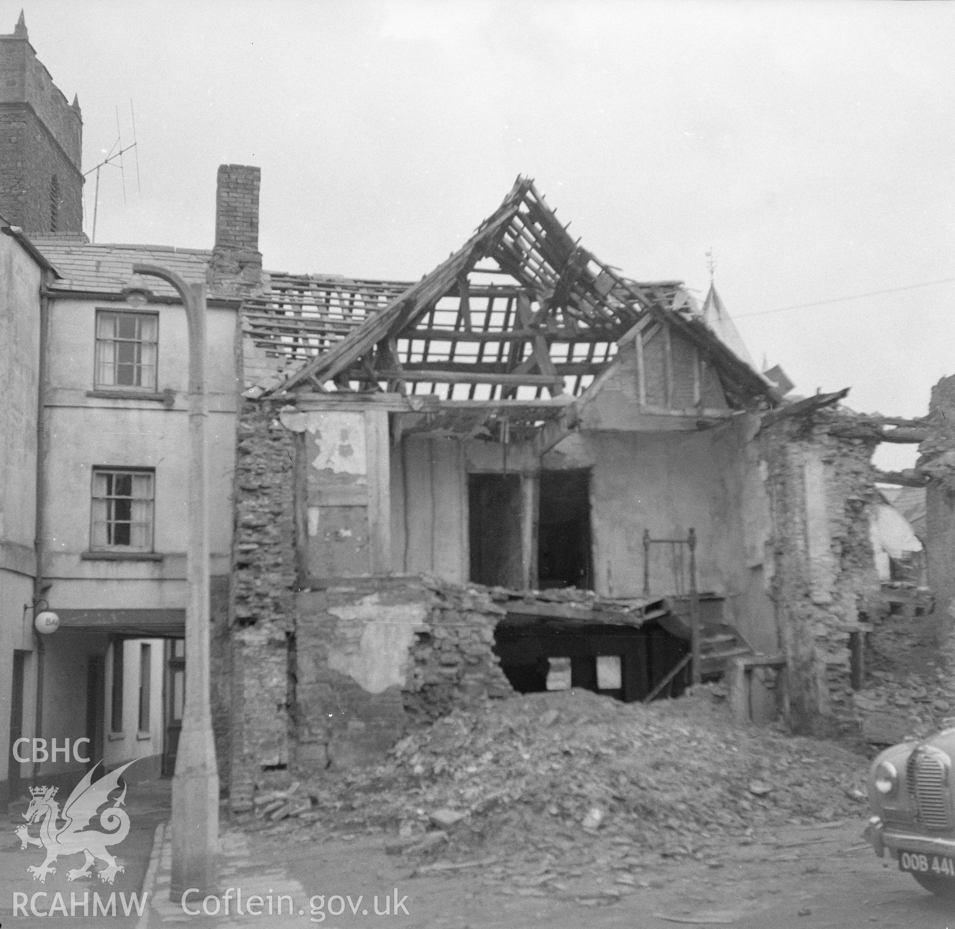 Digital copy of a nitrate negative showing view of the demolition of an unnamed house in or near Clytha.
