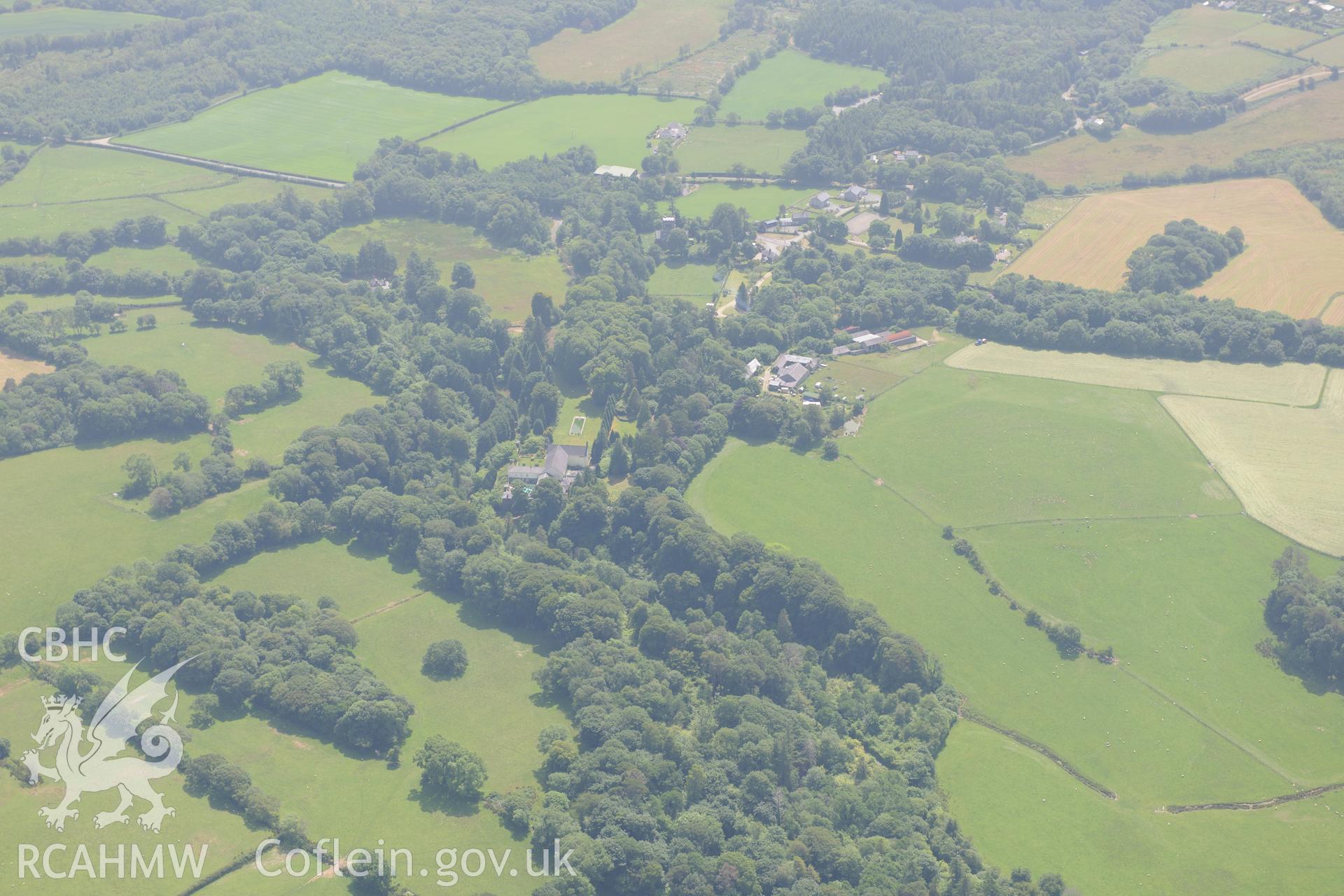 Bodfean Hall and its associated grounds and gardens, north west of Pwllheli, on the Lleyn Peninsula. Oblique aerial photograph taken during the Royal Commission?s programme of archaeological aerial reconnaissance by Toby Driver on 12th July 2013.