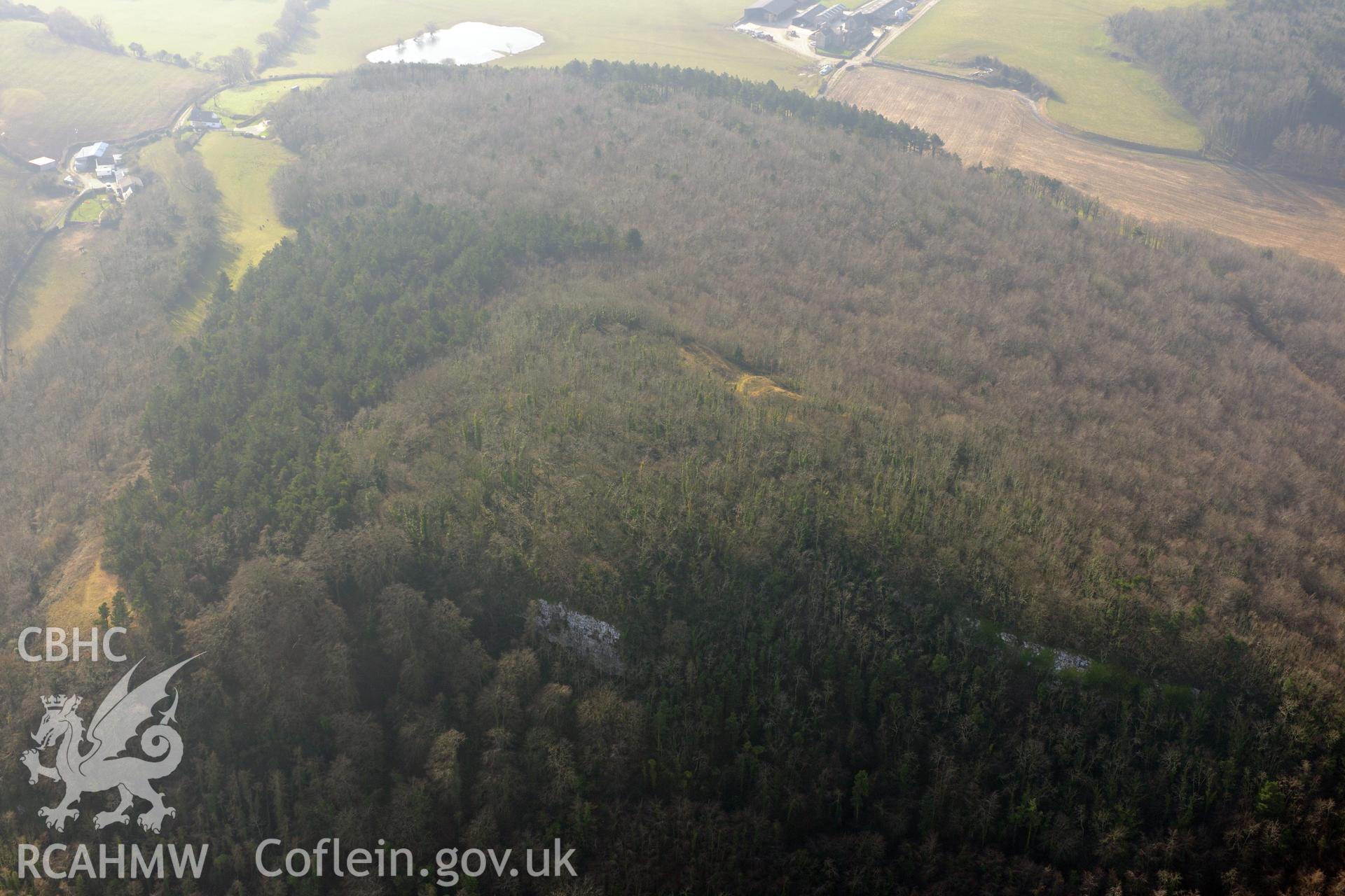 Castell Cawr hillfort, on the south western outskirts of Abergele. Oblique aerial photograph taken during the Royal Commission?s programme of archaeological aerial reconnaissance by Toby Driver on 28th February 2013.