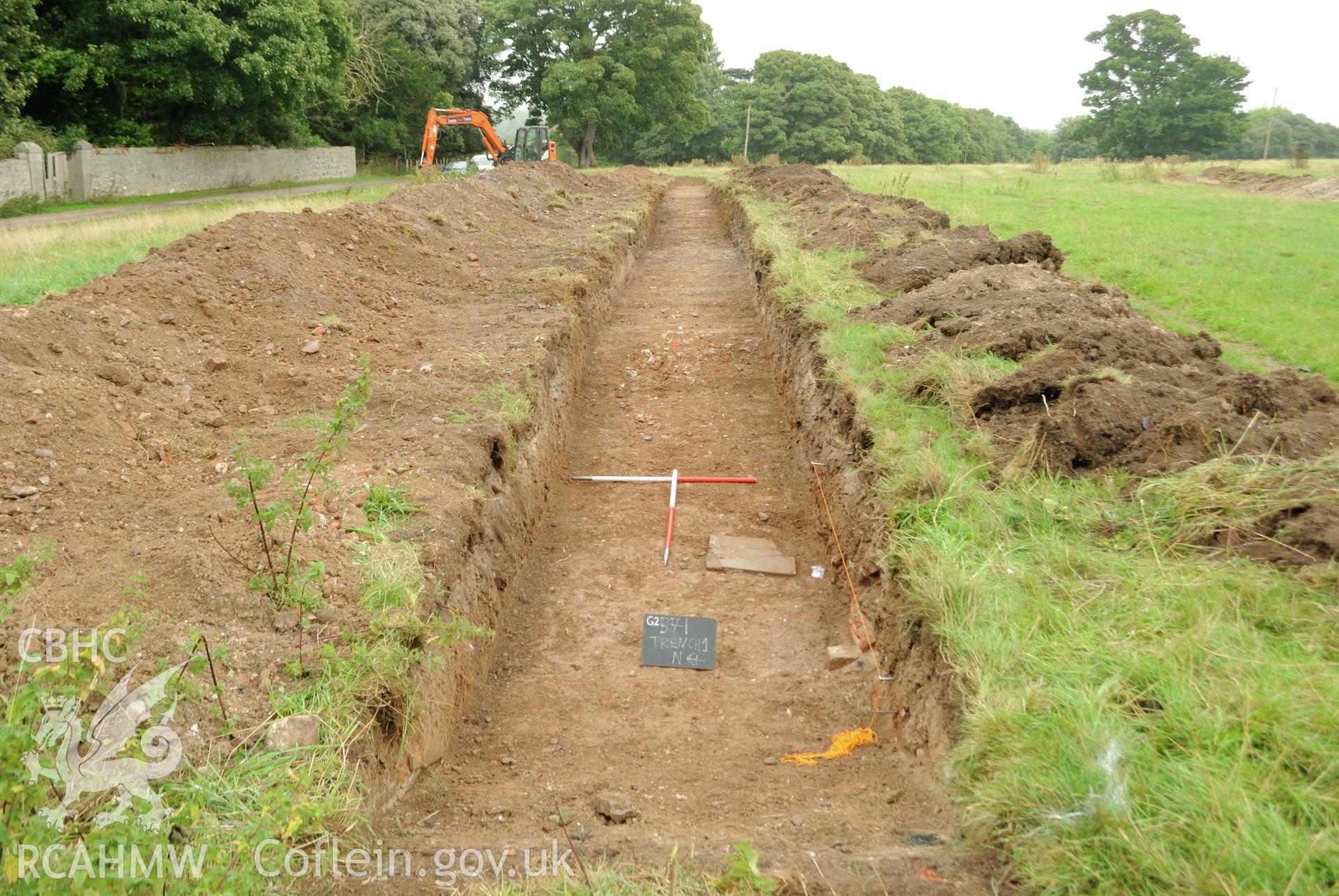 View from the west showing post excavation shot of trench 1; western terminal. Photographed during archaeological evaluation of Kinmel Park, Abergele, conducted by Gwynedd Archaeological Trust on 22nd August 2018. Project no. 2571.