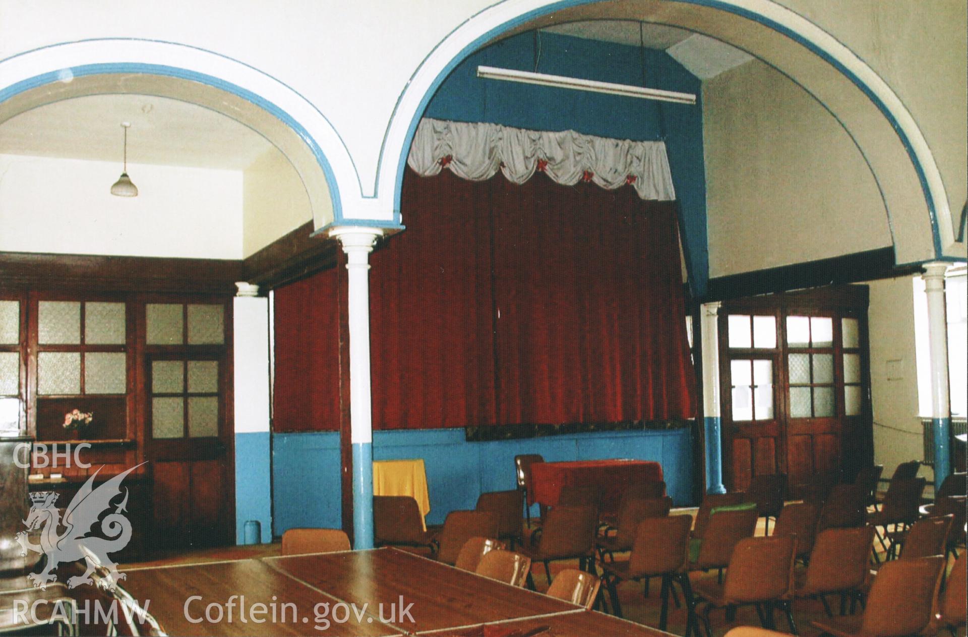 Colour photograph of the vestry and stage at Bethania chapel, Maesteg. Donated to the RCAHMW by Cyril Philips as part of the Digital Dissent Project.
