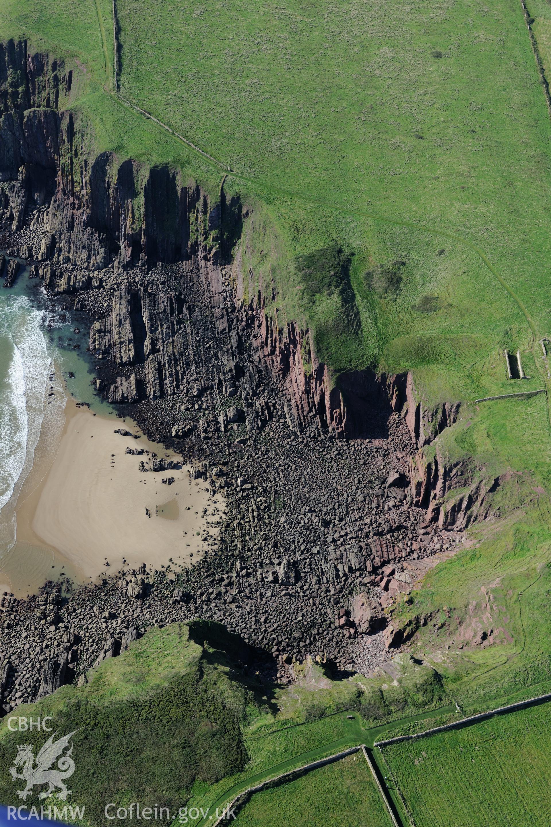 Caldey Island, about two miles off the south western coast of Tenby. Oblique aerial photograph taken during the Royal Commission's programme of archaeological aerial reconnaissance by Toby Driver on 30th September 2015.