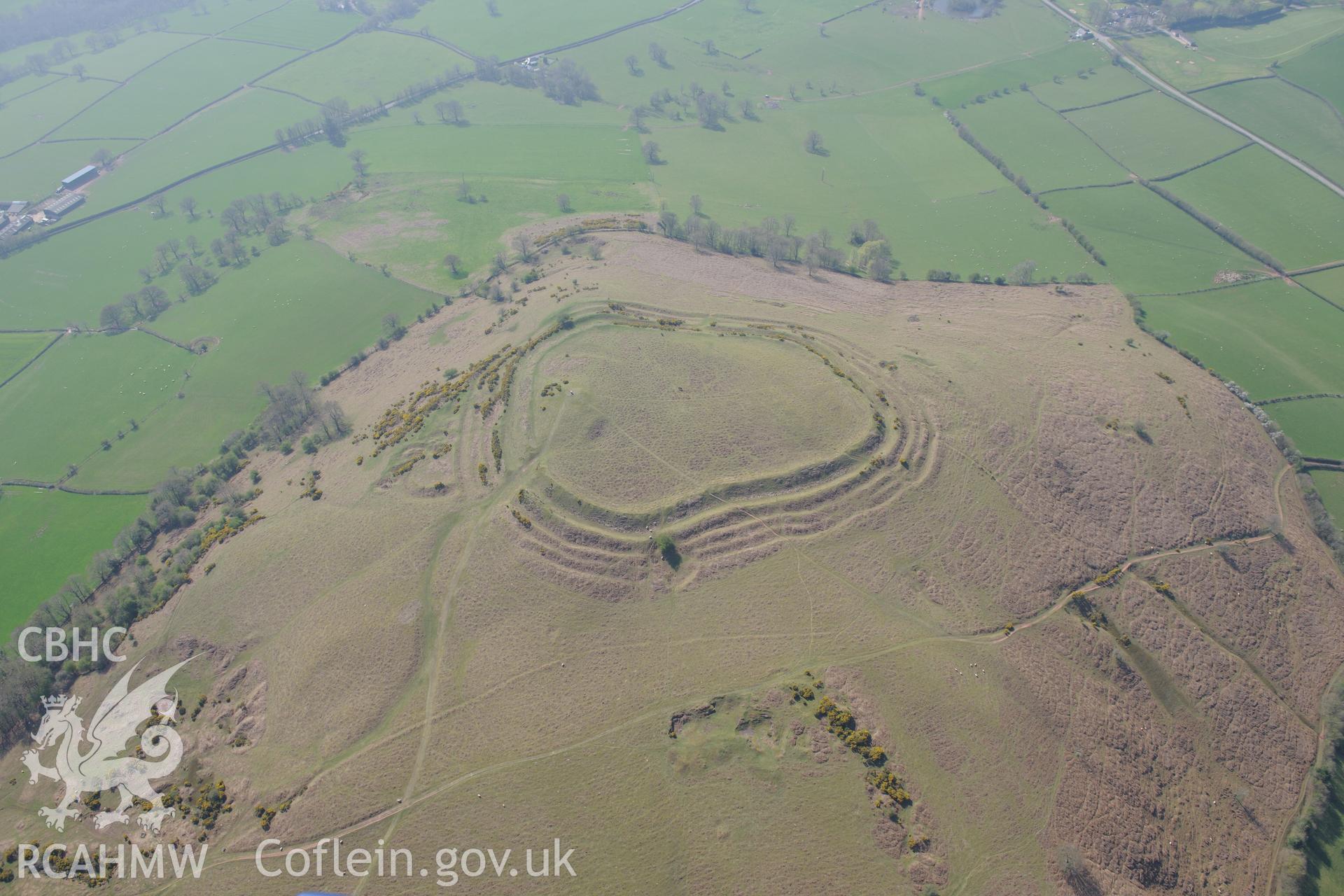 Pen-y-Crug Hillfort. Oblique aerial photograph taken during the Royal Commission's programme of archaeological aerial reconnaissance by Toby Driver on 21st April 2015