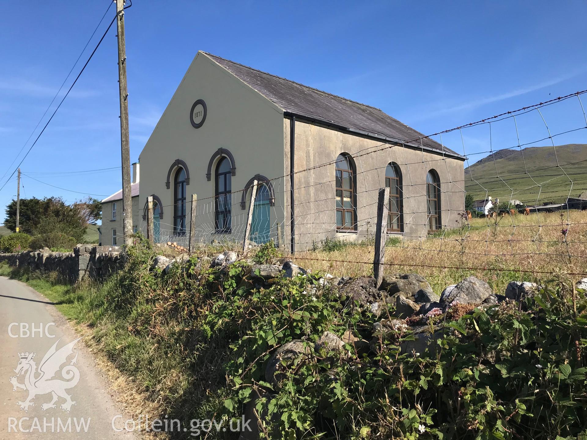 Colour photo showing exterior view of Cwmcoryn chapel, Llanaelhaearn, taken from the road by Paul R. Davis, 24th June 2018.