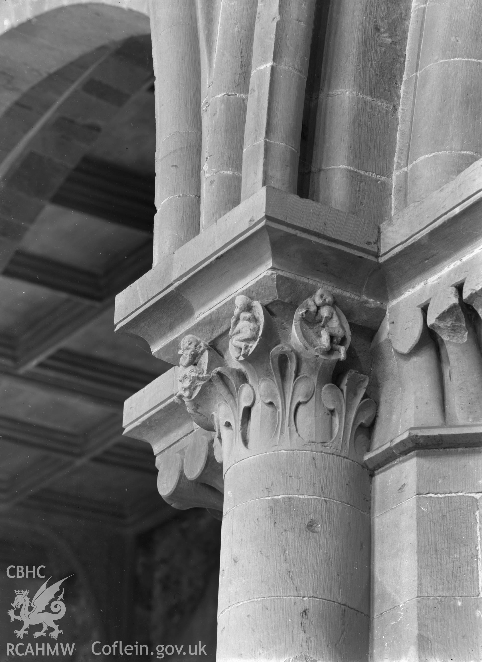 Digital copy of a black and white nitrate negative showing detail view of capital  at St. David's Cathedral, taken by E.W. Lovegrove, July 1936.