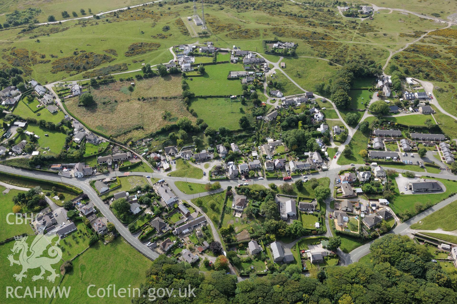 The village of Halkyn, near Mold. Oblique aerial photograph taken during the Royal Commission's programme of archaeological aerial reconnaissance by Toby Driver on 11th September 2015.