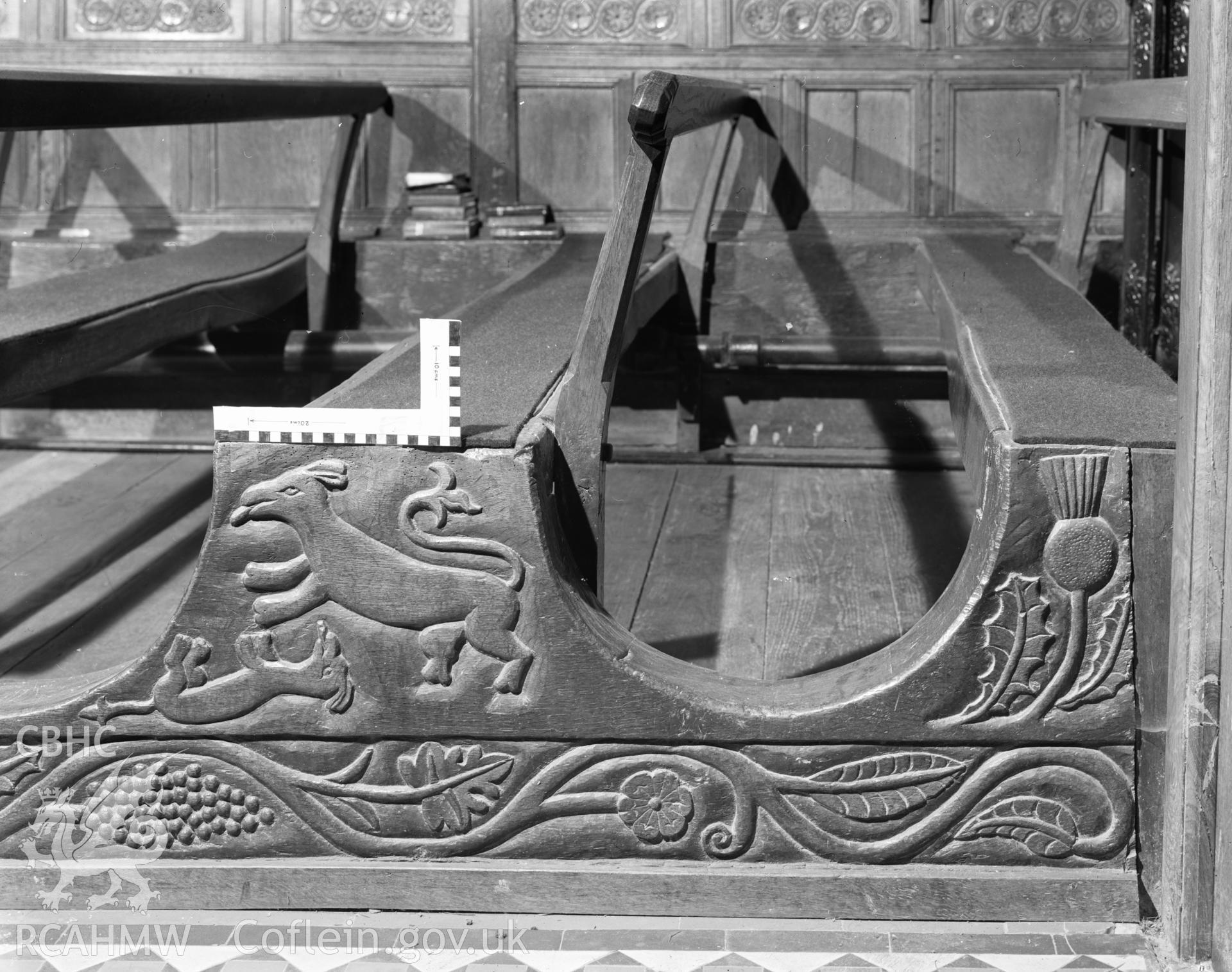 Digital copy of a black and white negative showing carved wooden pews at Rhug Chapel, taken by Department of Environment, 1976.