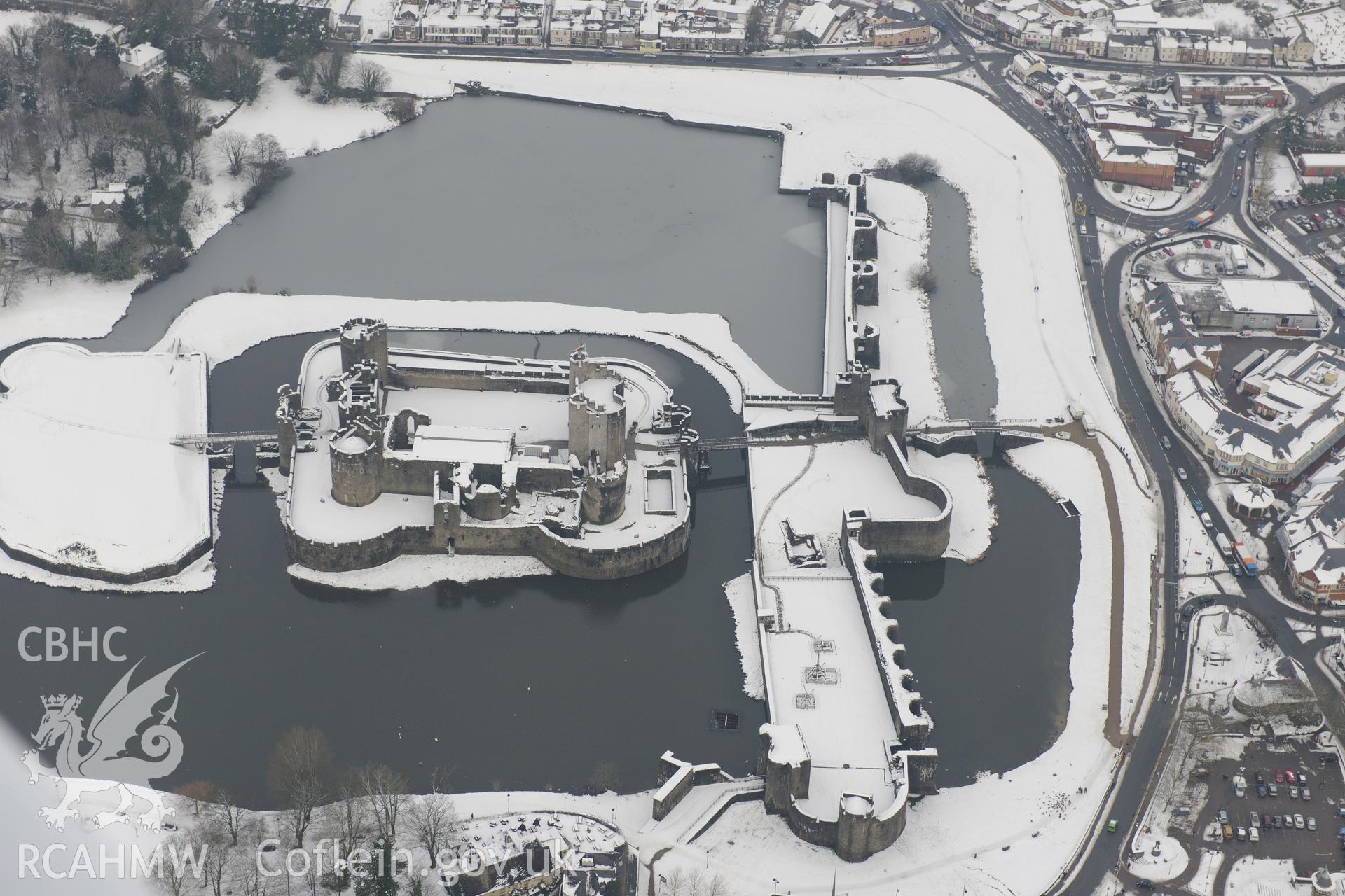 Caerphilly Castle. Oblique aerial photograph taken during the Royal Commission?s programme of archaeological aerial reconnaissance by Toby Driver on 24th January 2013.