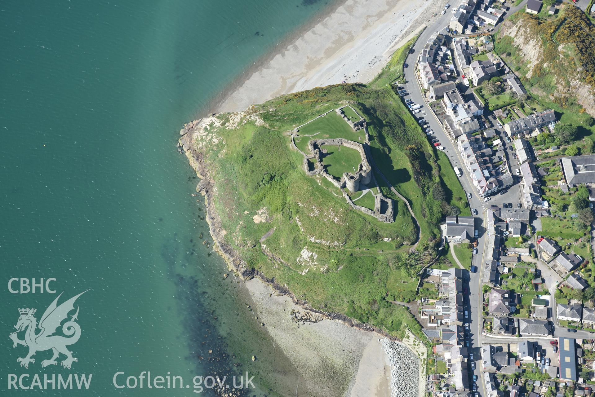 Aerial photography of Criccieth and its castle taken on 3rd May 2017.  Baseline aerial reconnaissance survey for the CHERISH Project. ? Crown: CHERISH PROJECT 2017. Produced with EU funds through the Ireland Wales Co-operation Programme 2014-2020. All ma