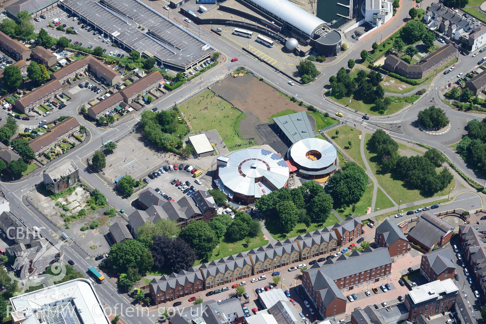 Mountstuart Primary School, Techniquest and St. David's Hotel, Butetown, Cardiff Bay. Oblique aerial photograph taken during the Royal Commission's programme of archaeological aerial reconnaissance by Toby Driver on 29th June 2015.