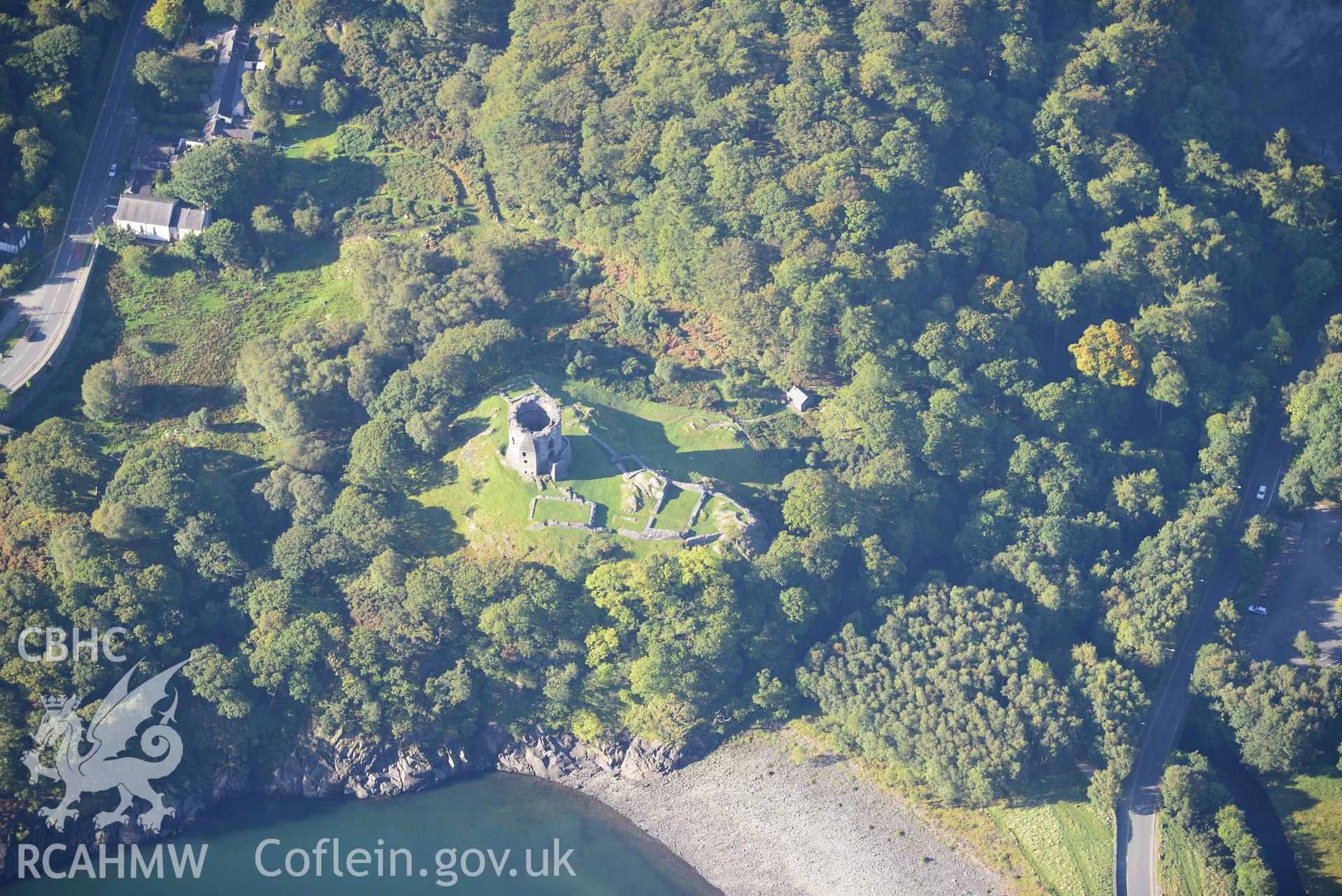 Dolbadarn Castle on the shore of Llyn Peris, Llanberis. Oblique aerial photograph taken during the Royal Commission's programme of archaeological aerial reconnaissance by Toby Driver on 2nd October 2015.