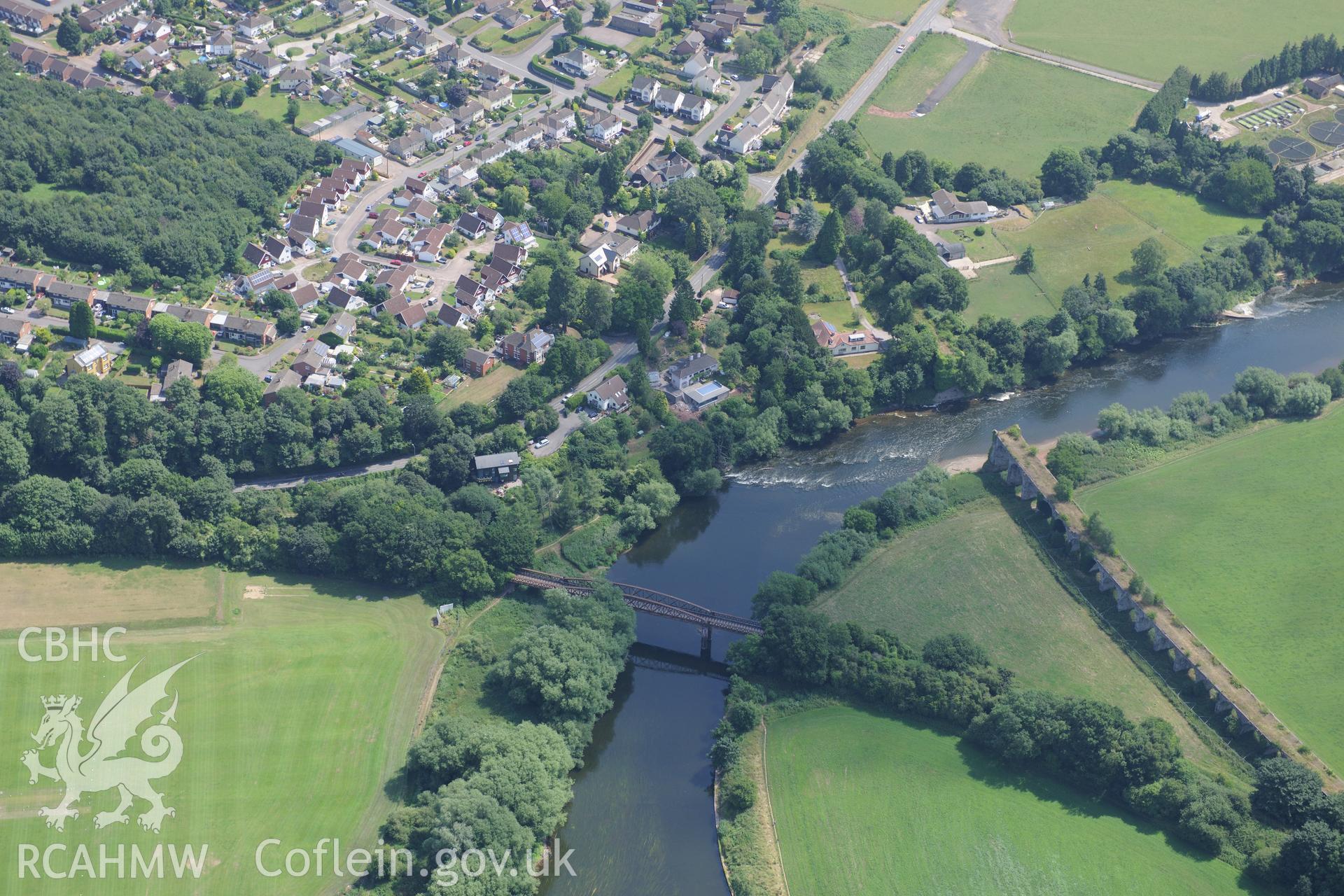 The Duke of Beaufort bridge and the Wye Viaduct (Coleford Monmouth Usk and Pontypool Railway), Monmouth. Oblique aerial photograph taken during the Royal Commission?s programme of archaeological aerial reconnaissance by Toby Driver on 1st August 2013.