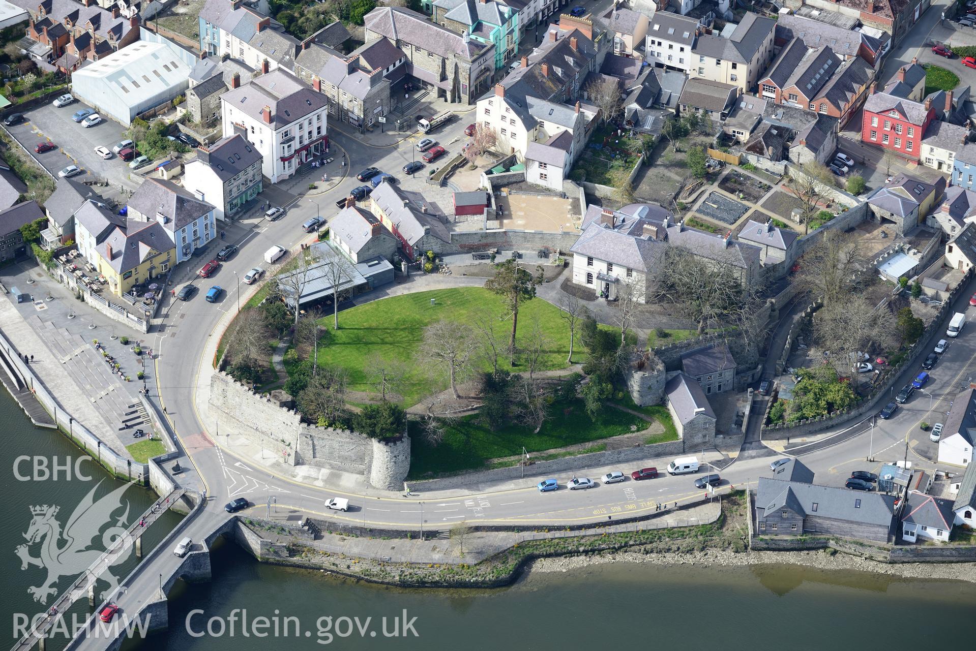 Cardigan Town, Castle, Castle House, Castle Stables, Castle Chambers and Grosvenor Hotel. Oblique aerial photograph taken during the Royal Commission's programme of archaeological aerial reconnaissance by Toby Driver 15th April 2015.