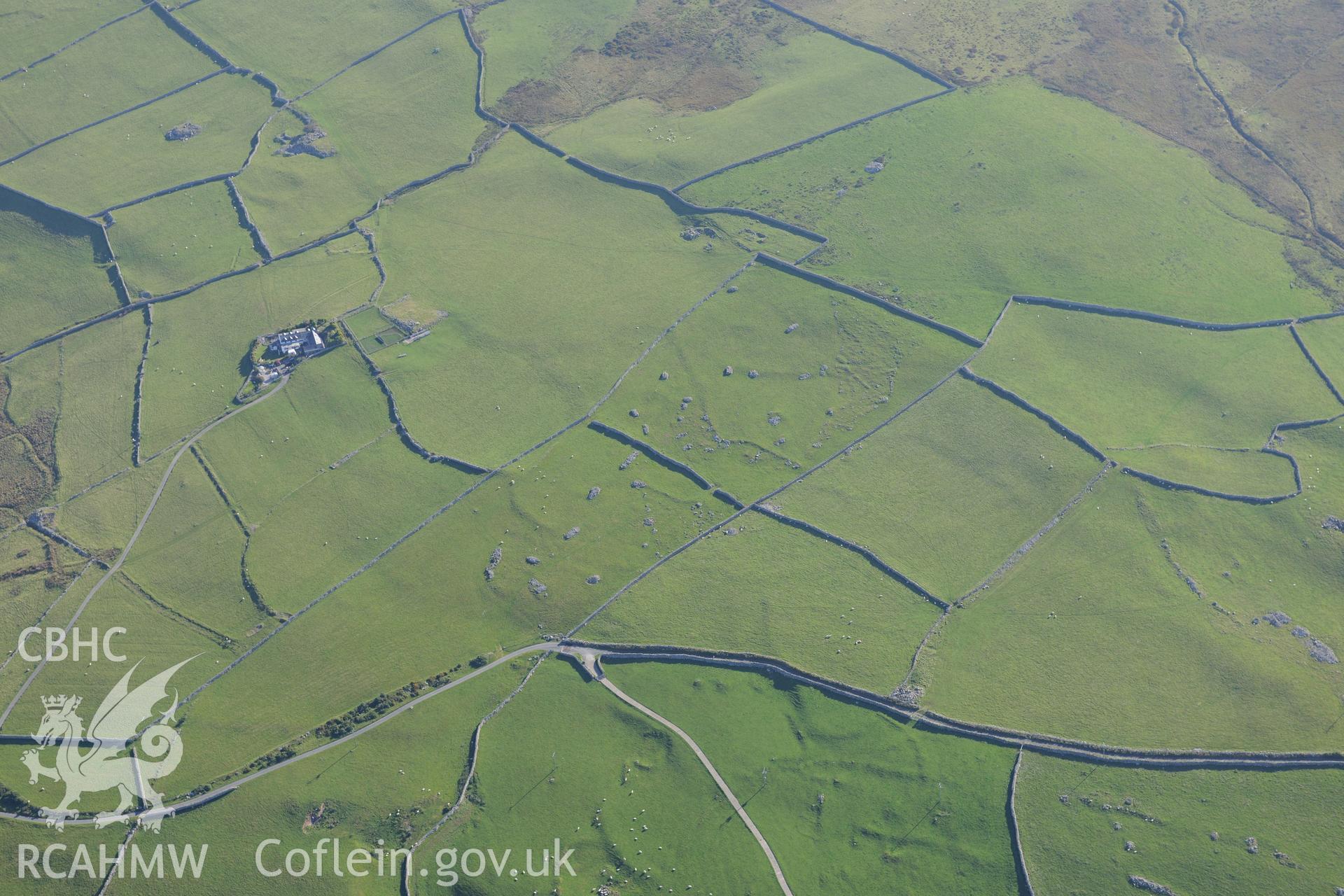 Rhiwgaeron farm, Llwyngwril. Oblique aerial photograph taken during the Royal Commission's programme of archaeological aerial reconnaissance by Toby Driver on 2nd October 2015.