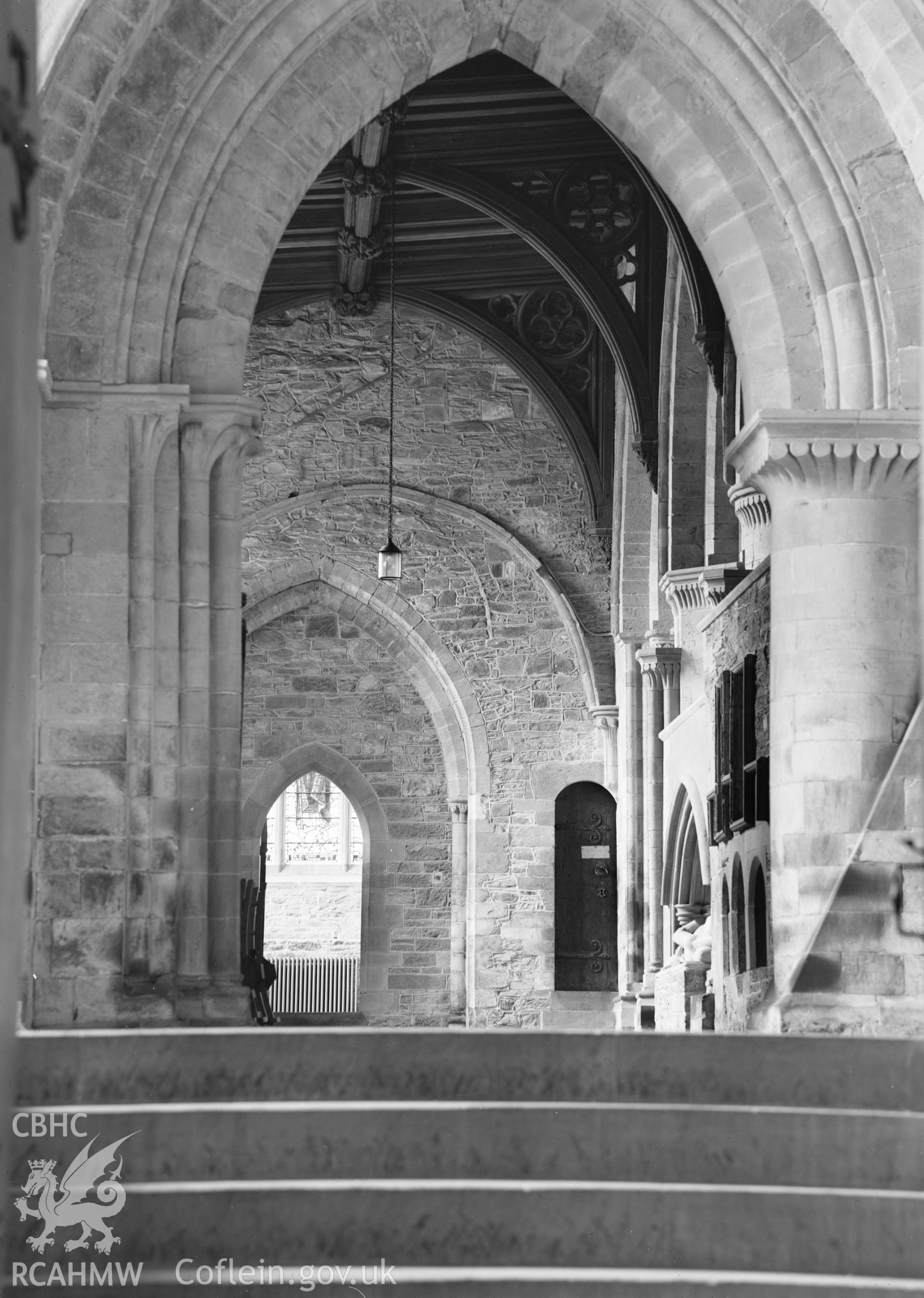 Digital copy of a black and white nitrate negative showing interior view of entrance at St. David's Cathedral, taken by E.W. Lovegrove, July 1936.