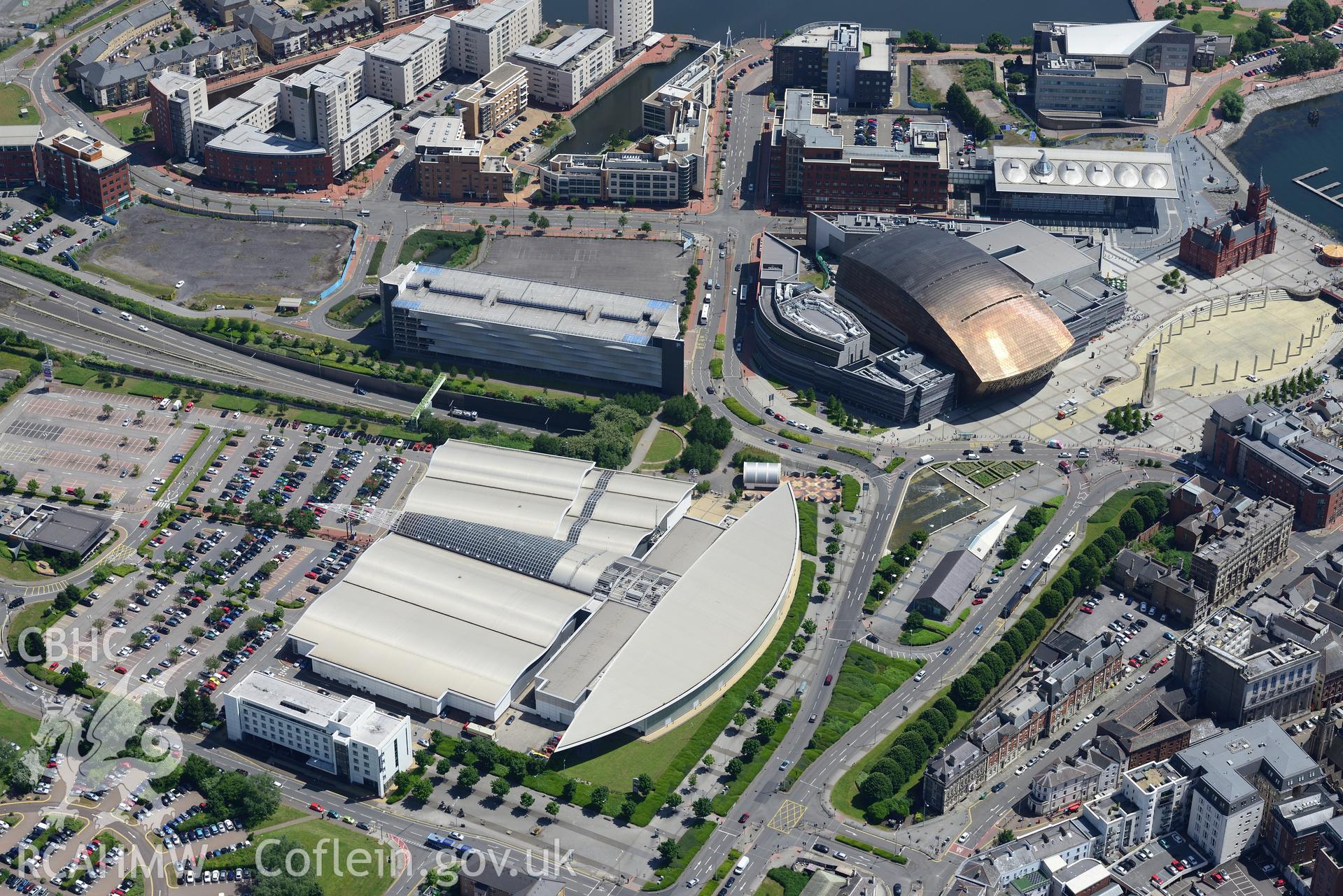 Crickhowell House, the Pierhead Building, Senedd Assembly Building; Wales Millennium Centre and the Red Dragon Centre, Cardiff Bay. Oblique aerial photograph taken during the Royal Commission's programme of archaeological aerial reconnaissance by Toby Driver on 29th June 2015.