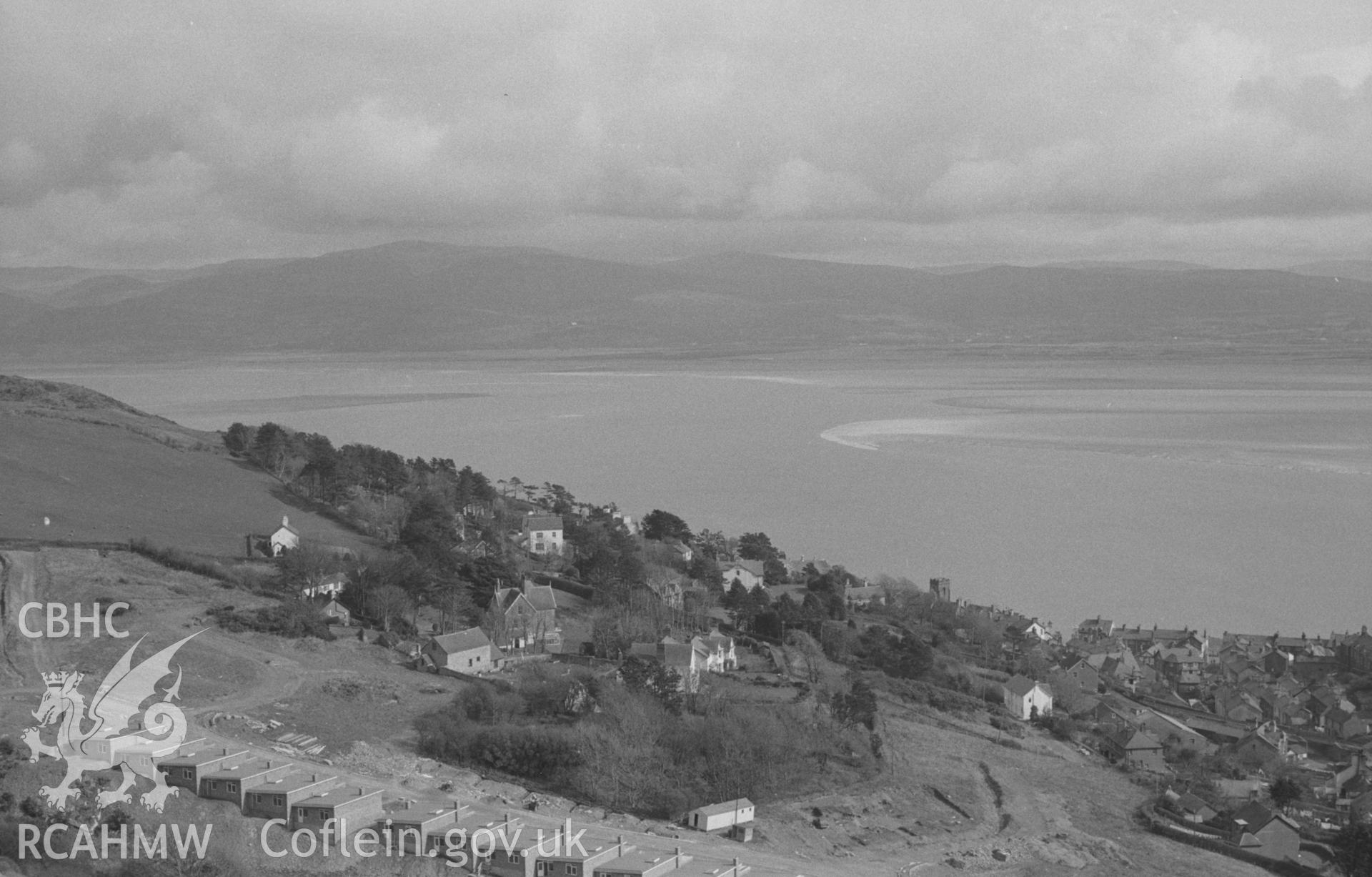 Digital copy of a black and white negative showing view across Dyfi estuary from above Aberdovey. Photographed in April 1964 by Arthur O. Chater from Grid Reference SN 611 964, looking east - south south west.